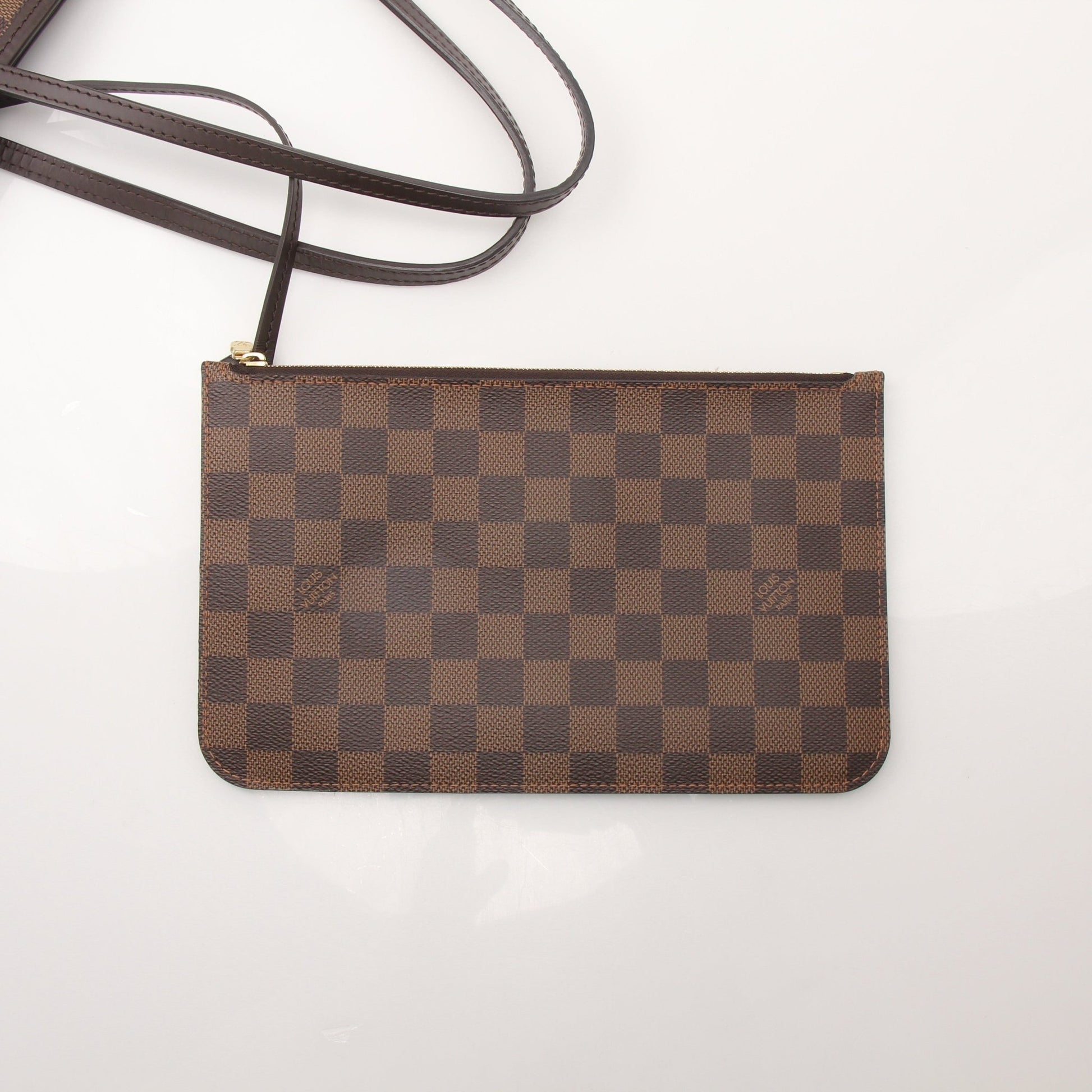 Louis Vuitton Neverfull MM tote handbag by Gold & Beyond, showing beige monogram canvas with leather trim and spacious interior.