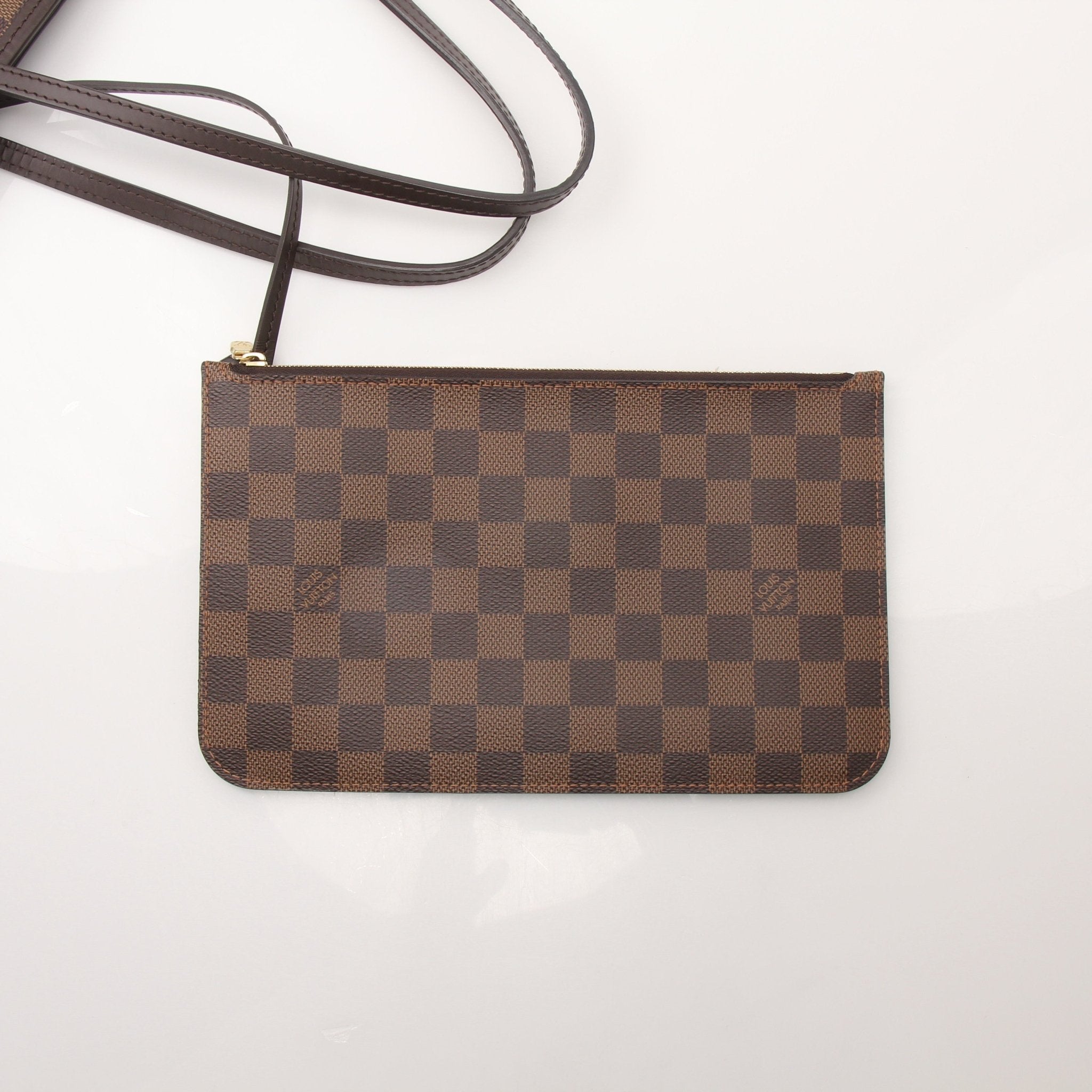 Louis Vuitton Neverfull MM tote handbag by Gold & Beyond, showing beige monogram canvas with leather trim and spacious interior.