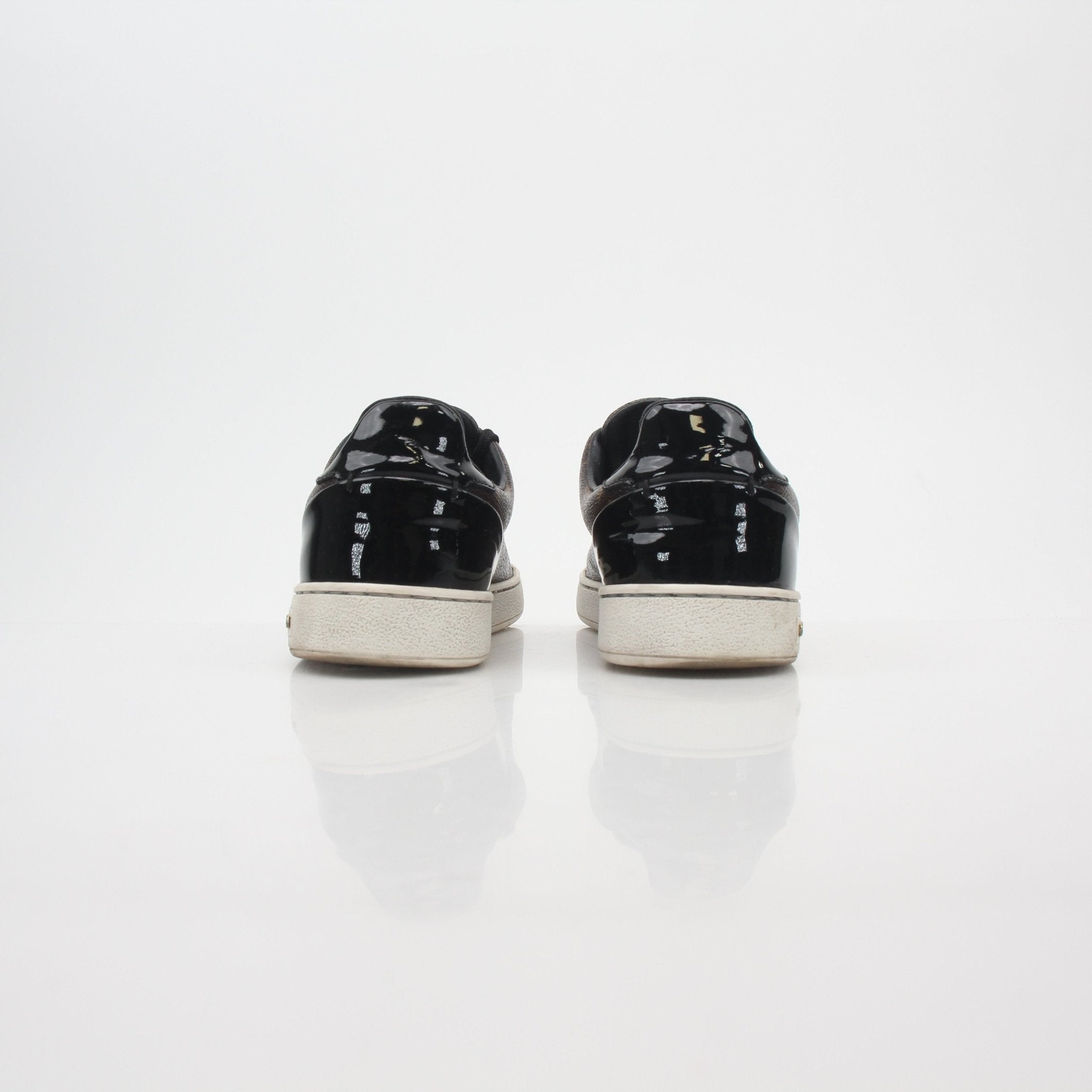 Louis Vuitton Monogram Frontrow low top sneakers by Gold & Beyond, stylish shoes with iconic monogram design and casual athletic look.