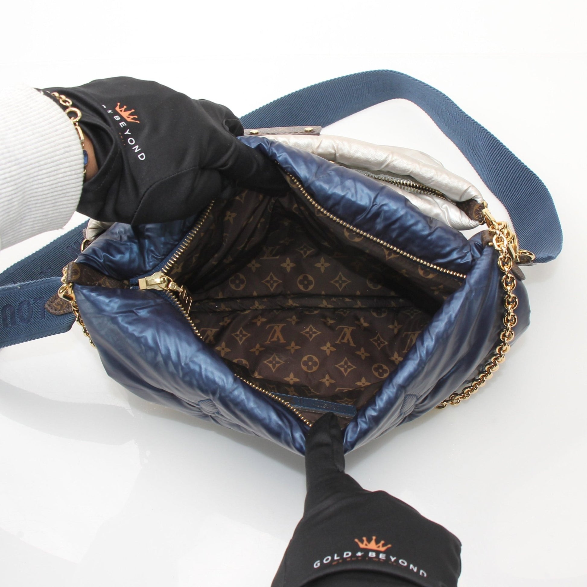 Gold & Beyond Louis Vuitton Multi-Pochette Accessoires Maxi Pillow handbag with adjustable shoulder strap and signature monogram pattern.