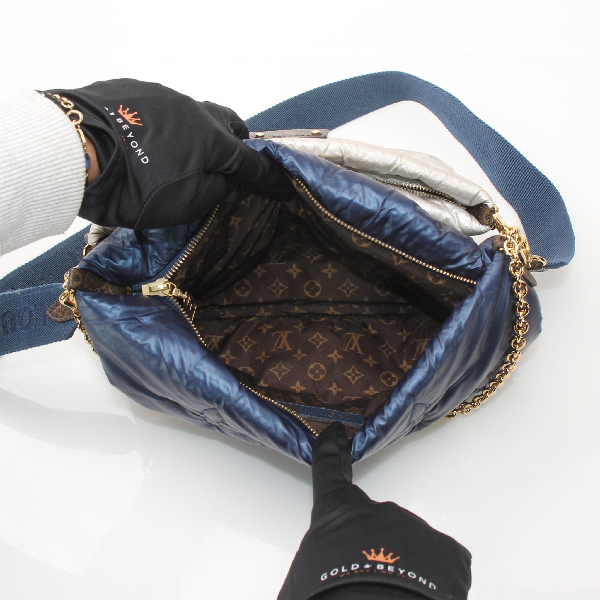 Gold & Beyond Louis Vuitton Multi-Pochette Accessoires Maxi Pillow handbag with adjustable shoulder strap and signature monogram pattern.