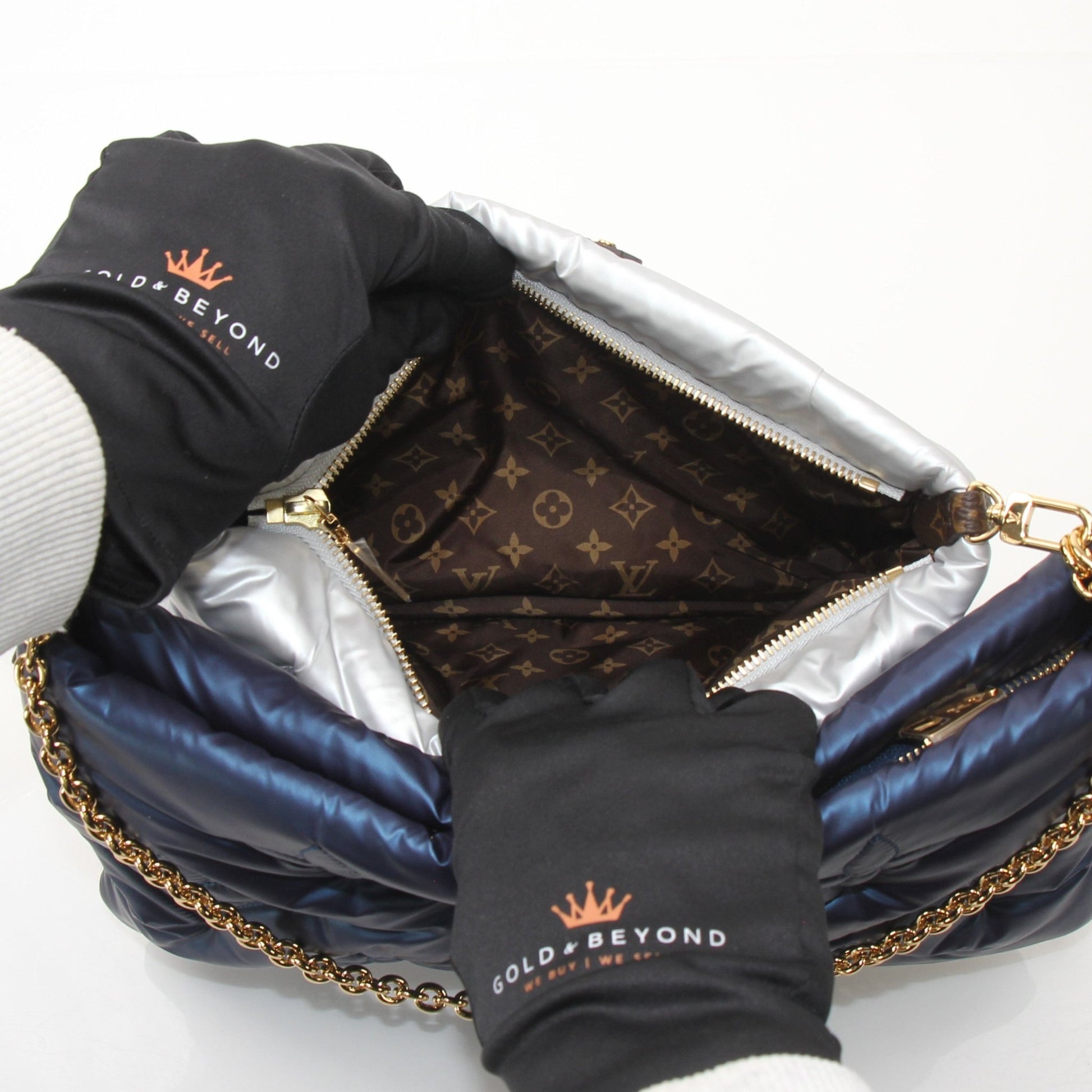 Louis Vuitton LV Pillow Multi Pochette Accessoires Maxi shoulder handbag with gold hardware and black leather accents.