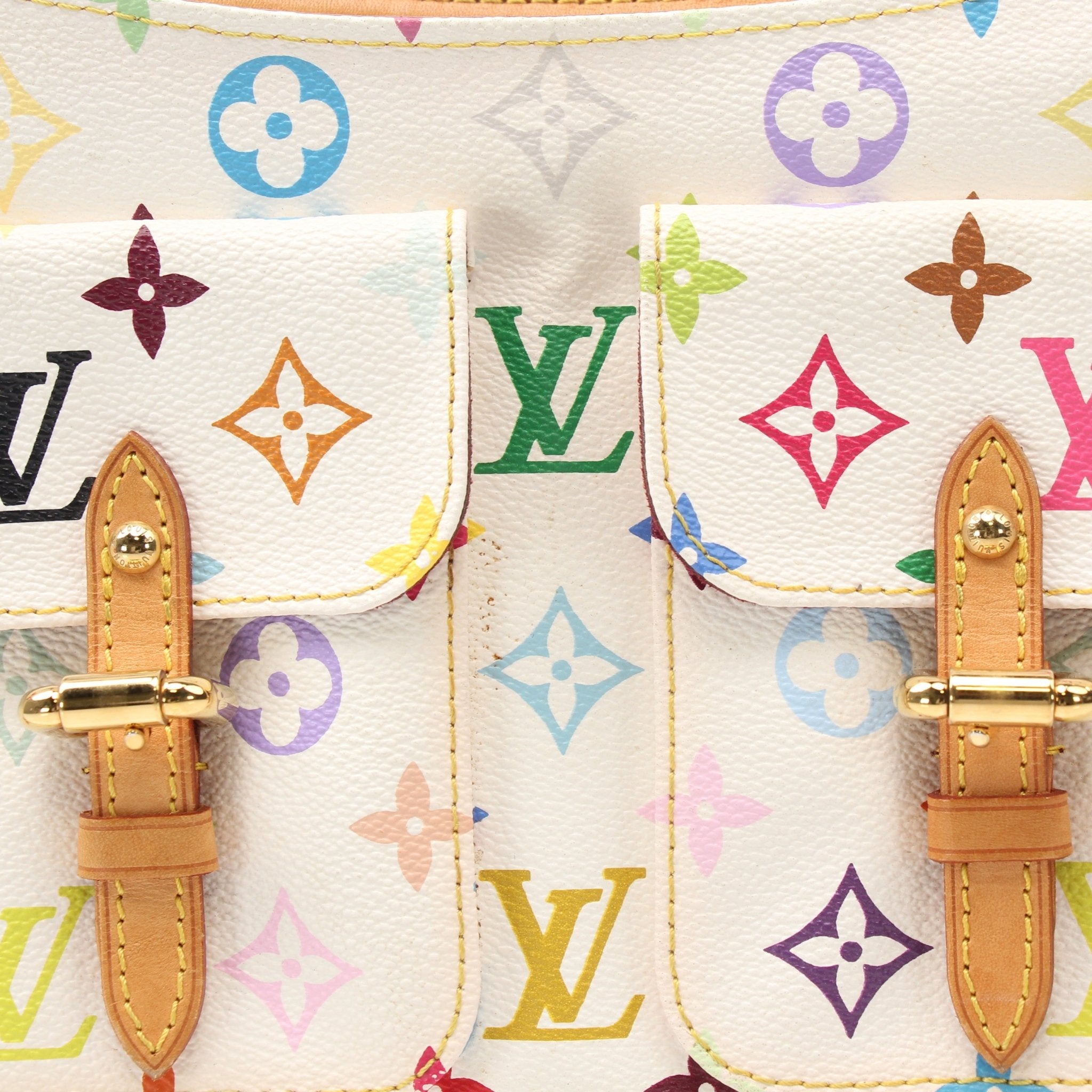 Louis Vuitton Lodge PM white shoulder handbag with gold hardware, stylishly displayed on a neutral background.