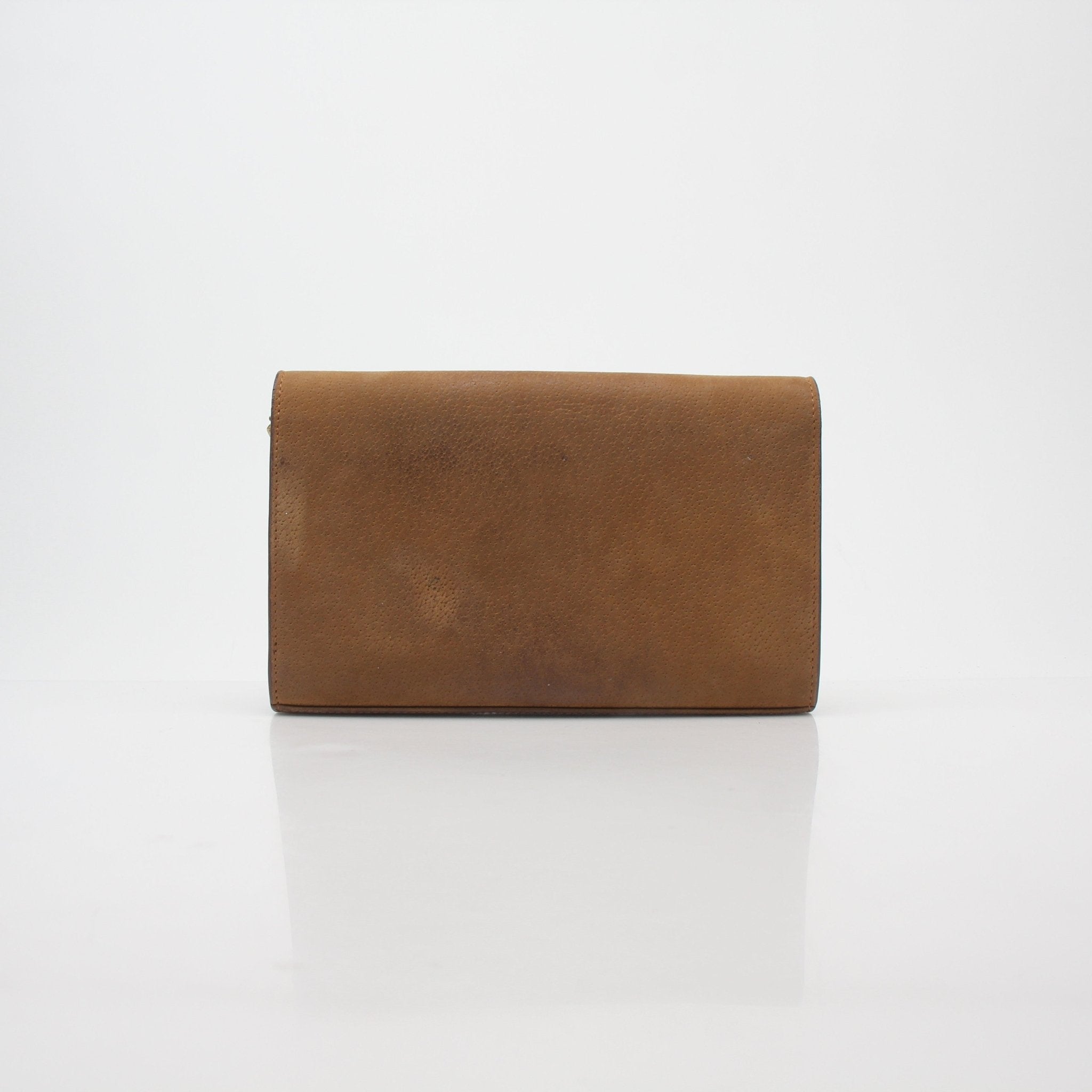 Brown suede Saint Laurent Cassandre chain wallet handbag with gold hardware and structured design.