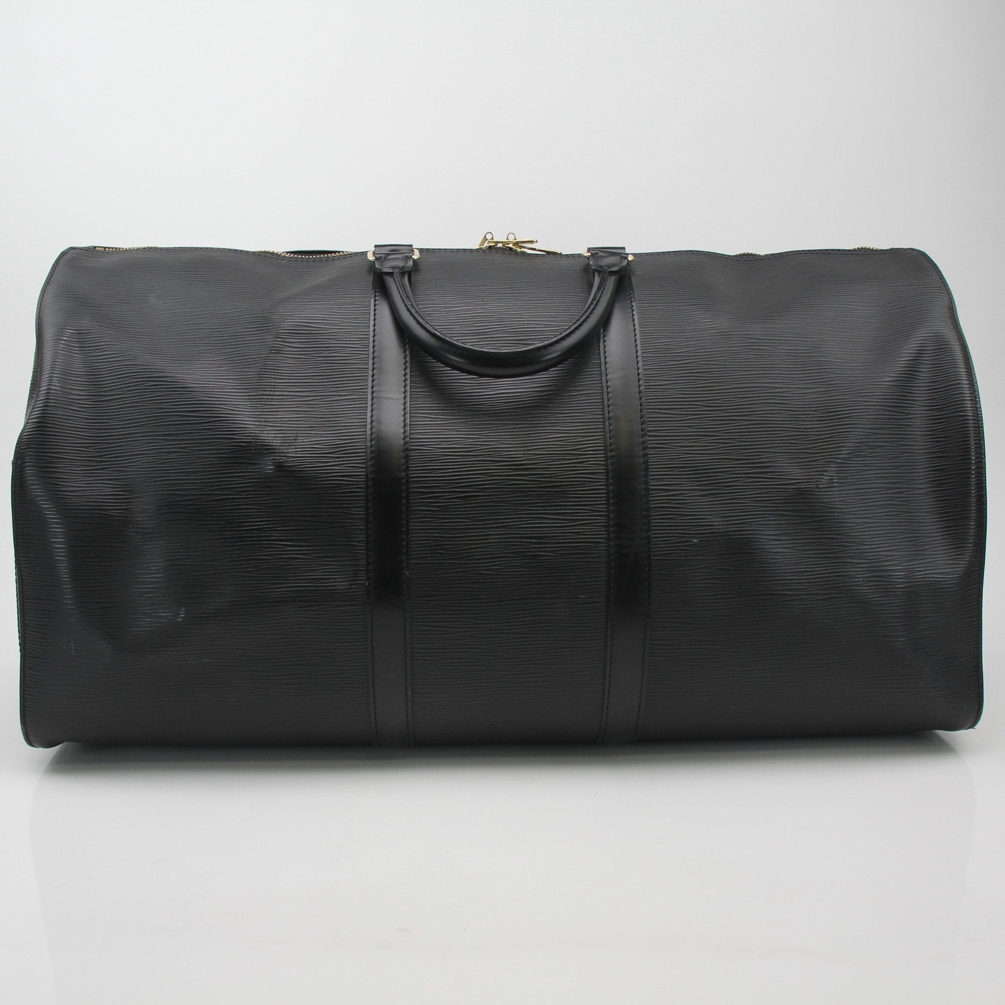 Louis Vuitton Keepall Bandoulière Epi leather travel bag with handles and shoulder strap, showcasing its textured blue surface.