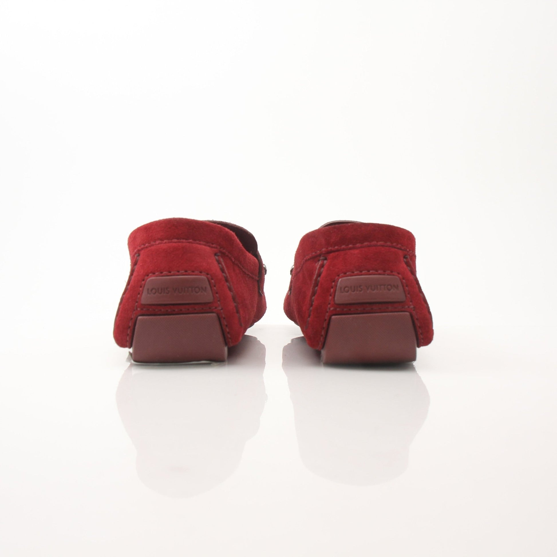Red suede Louis Vuitton Monte Carlo loafers by Gold & Beyond, showcasing stylish slip-on shoes with a sleek design.