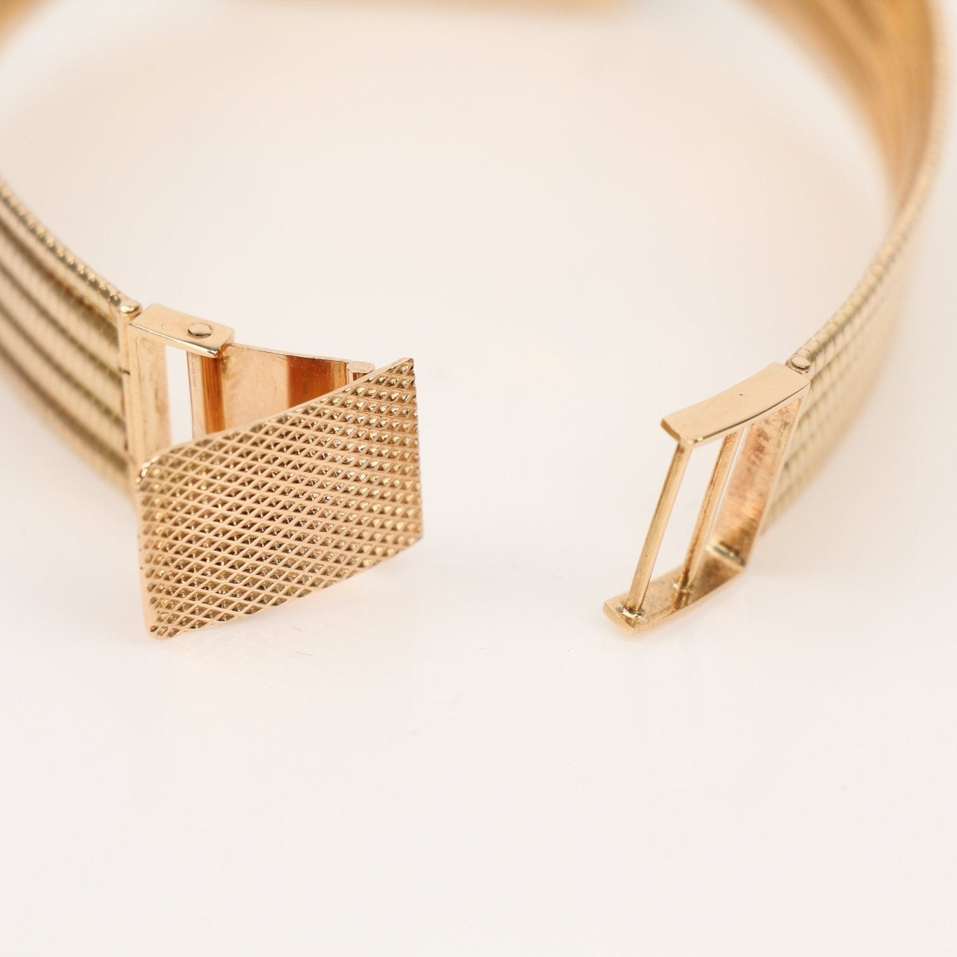 Gold and Beyond Jaeger-LeCoultre gold dress watch featuring a sleek design and elegant craftsmanship.