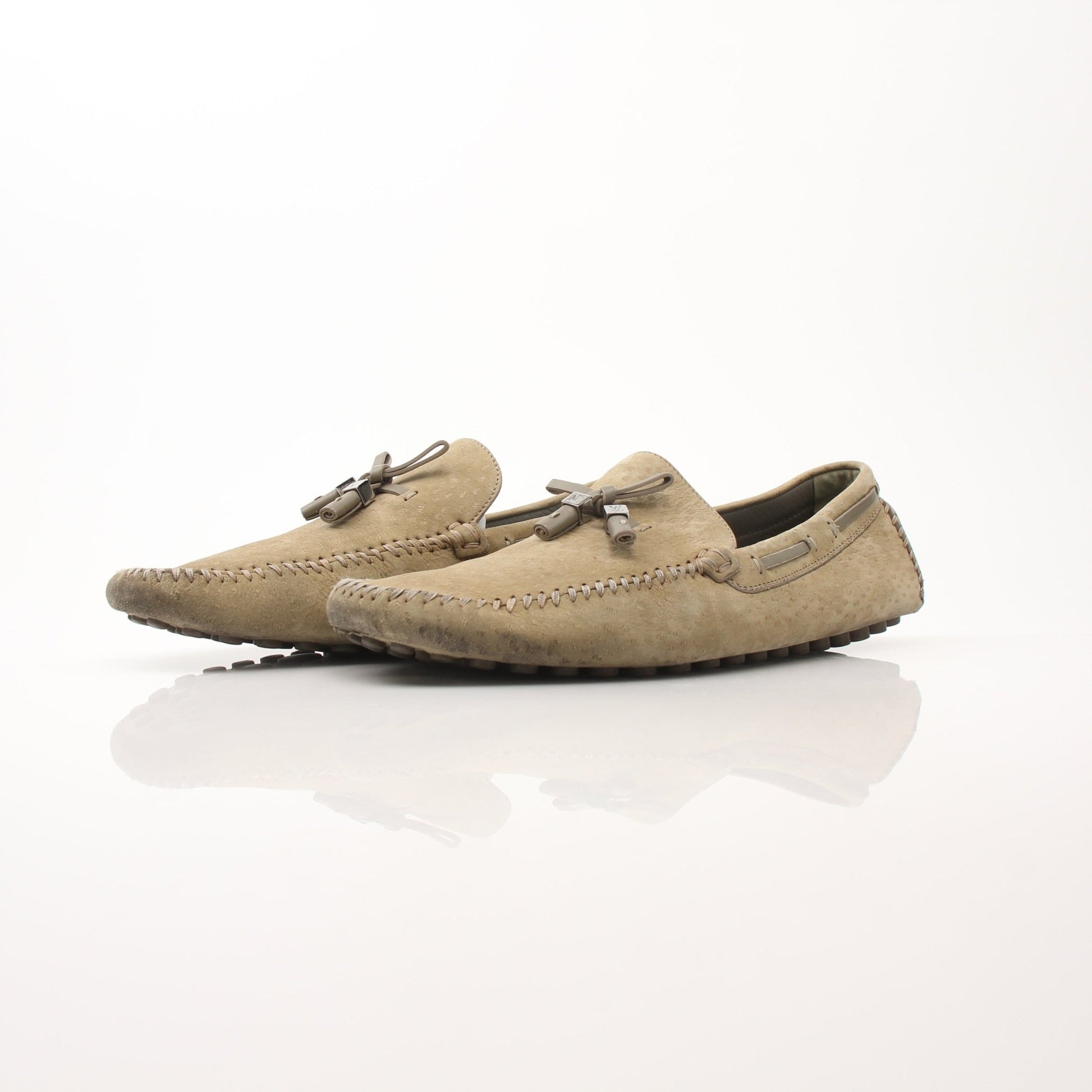 Louis Vuitton LV Driver Moccasins in beige suede, gold and beyond shoes, stylish loafers with classic design and comfortable fit.