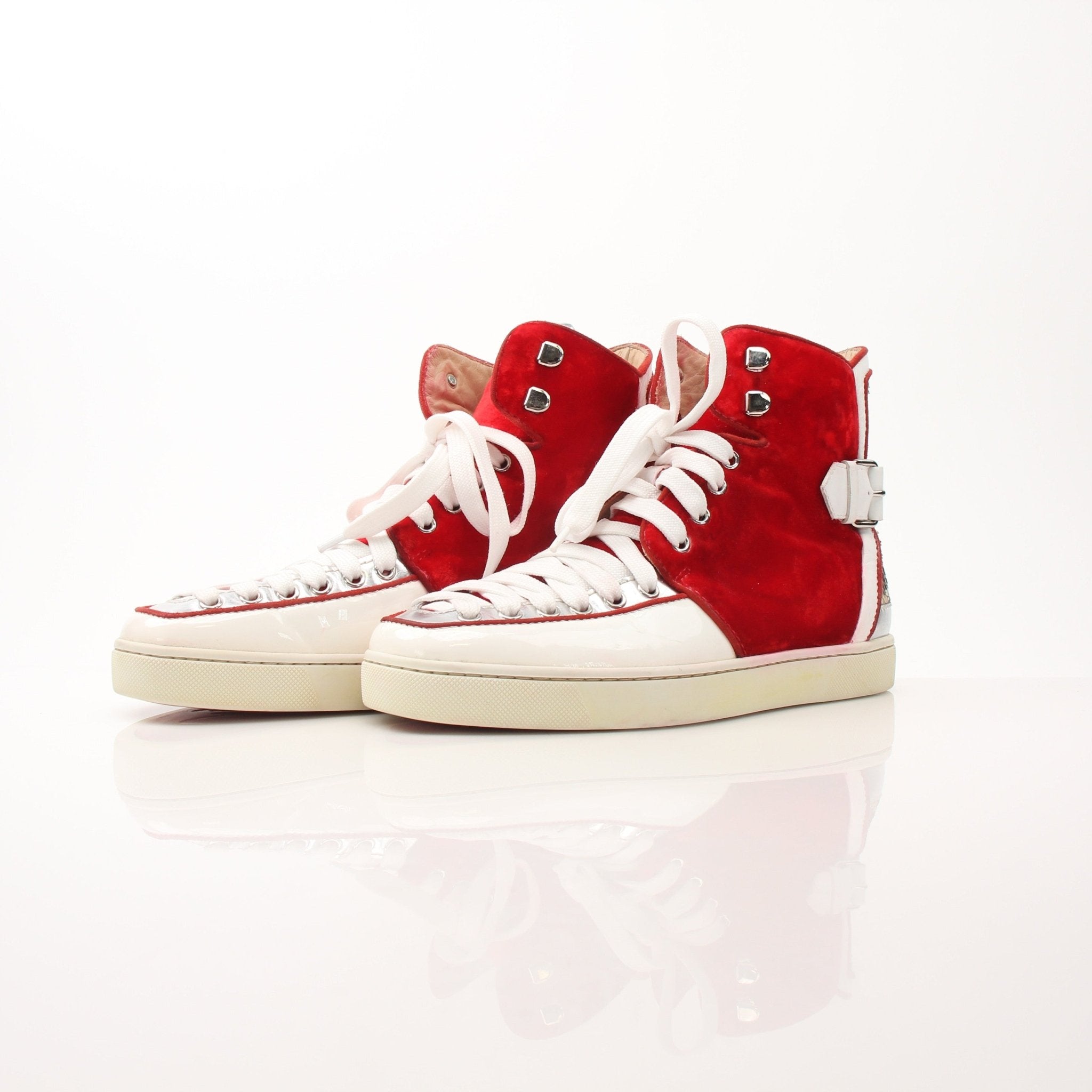 Christian Louboutin Men’s Python Alfie high top sneakers with red velvet and gold accents, stylish shoes with intricate detailing.