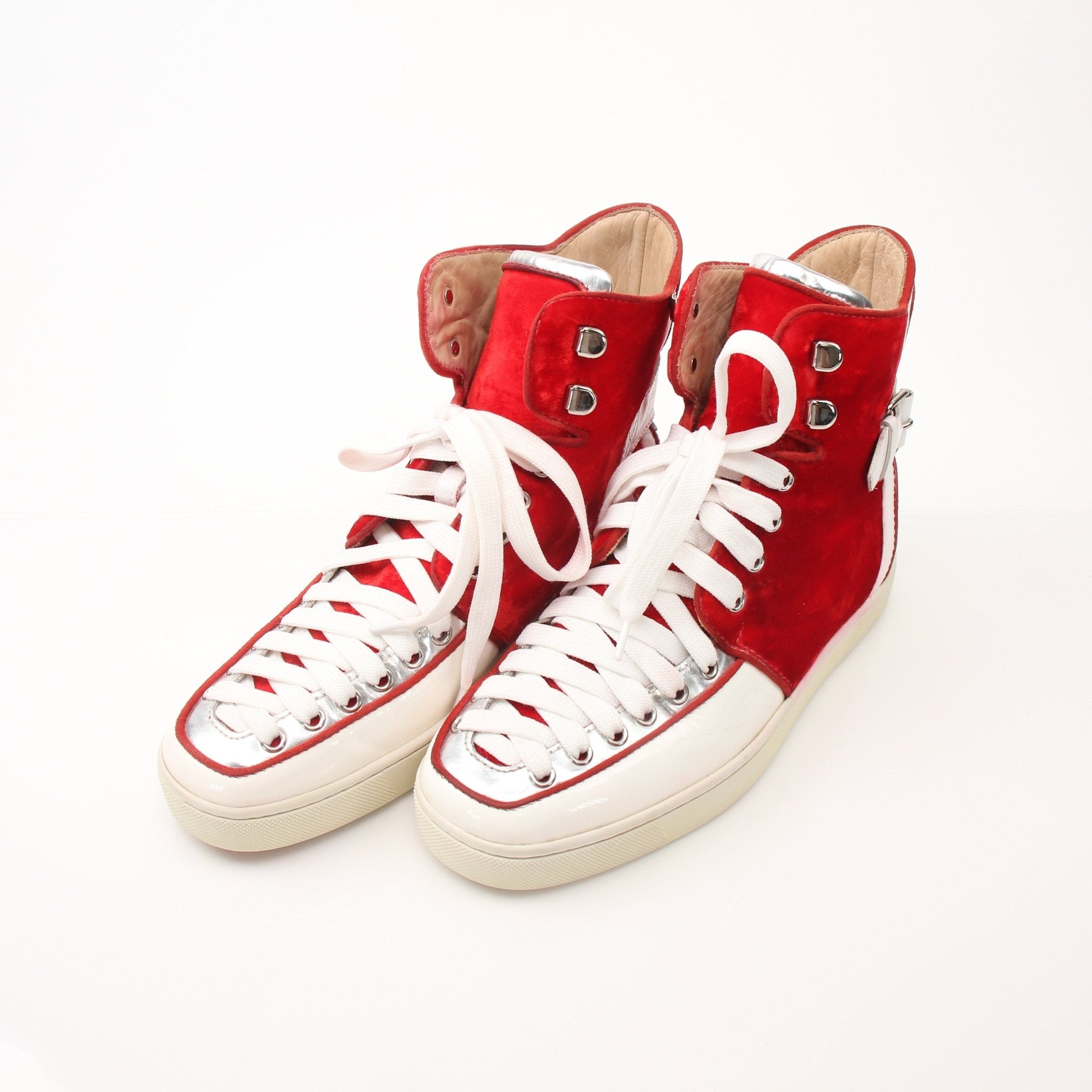 Christian Louboutin men's python Alfie high-top sneakers with red velvet accents, featuring stylish shoe design and luxurious materials.
