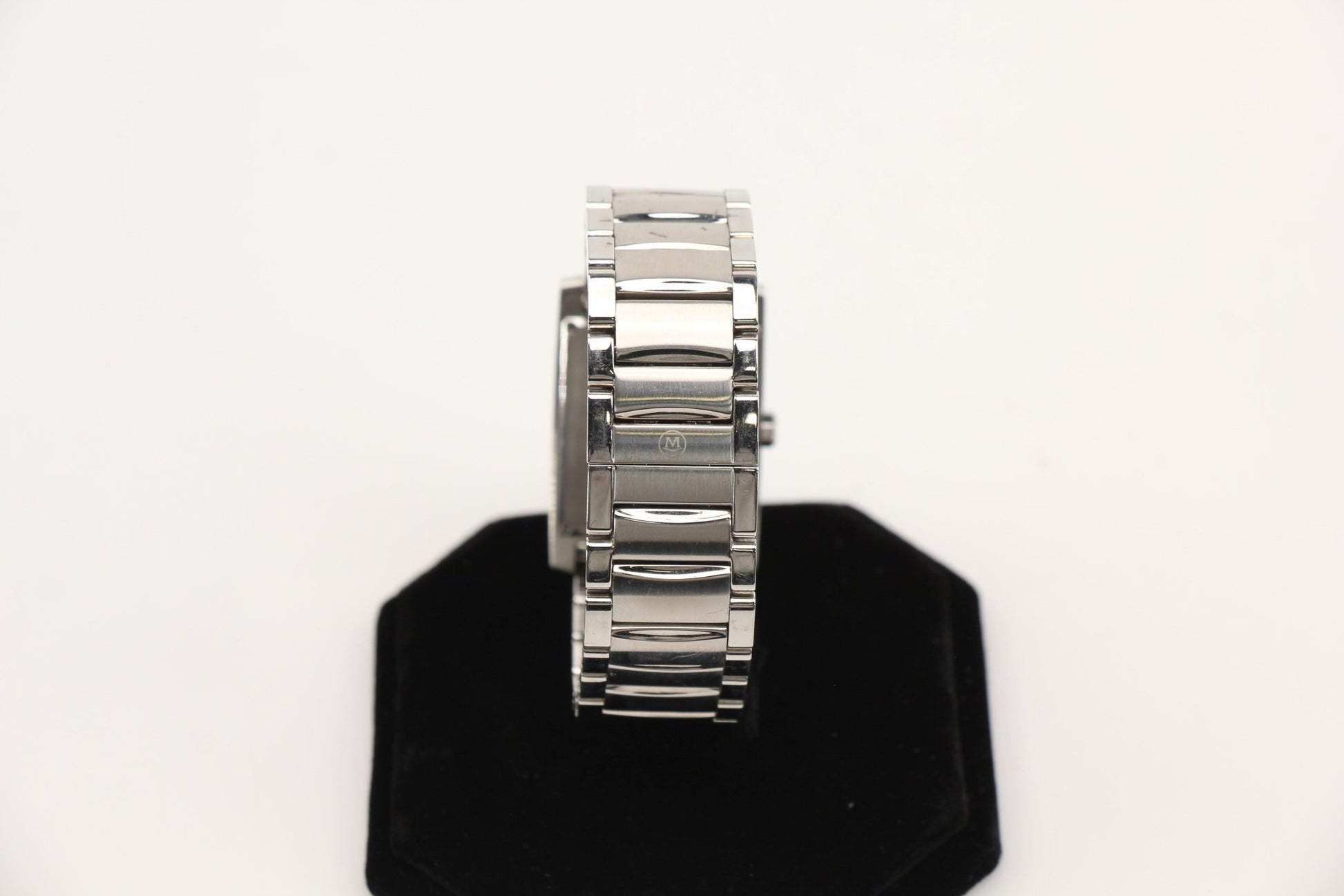 Movado Museum Classic watch with black dial and stainless steel case, displayed on a white background.