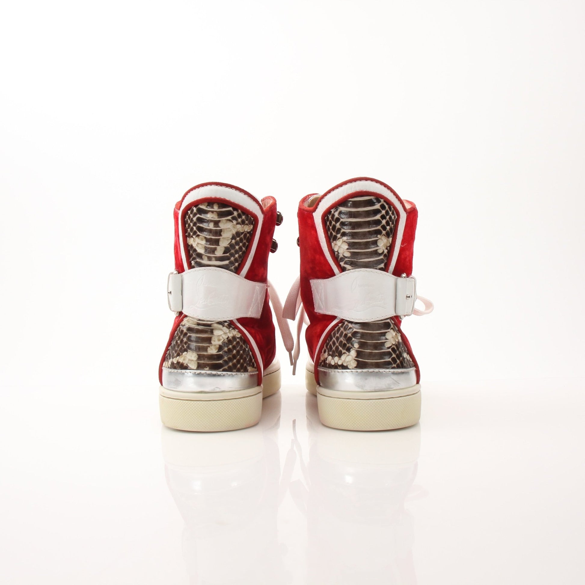 Christian Louboutin men's python Alfie high-top sneakers featuring red velvet accents and stylish shoe design.