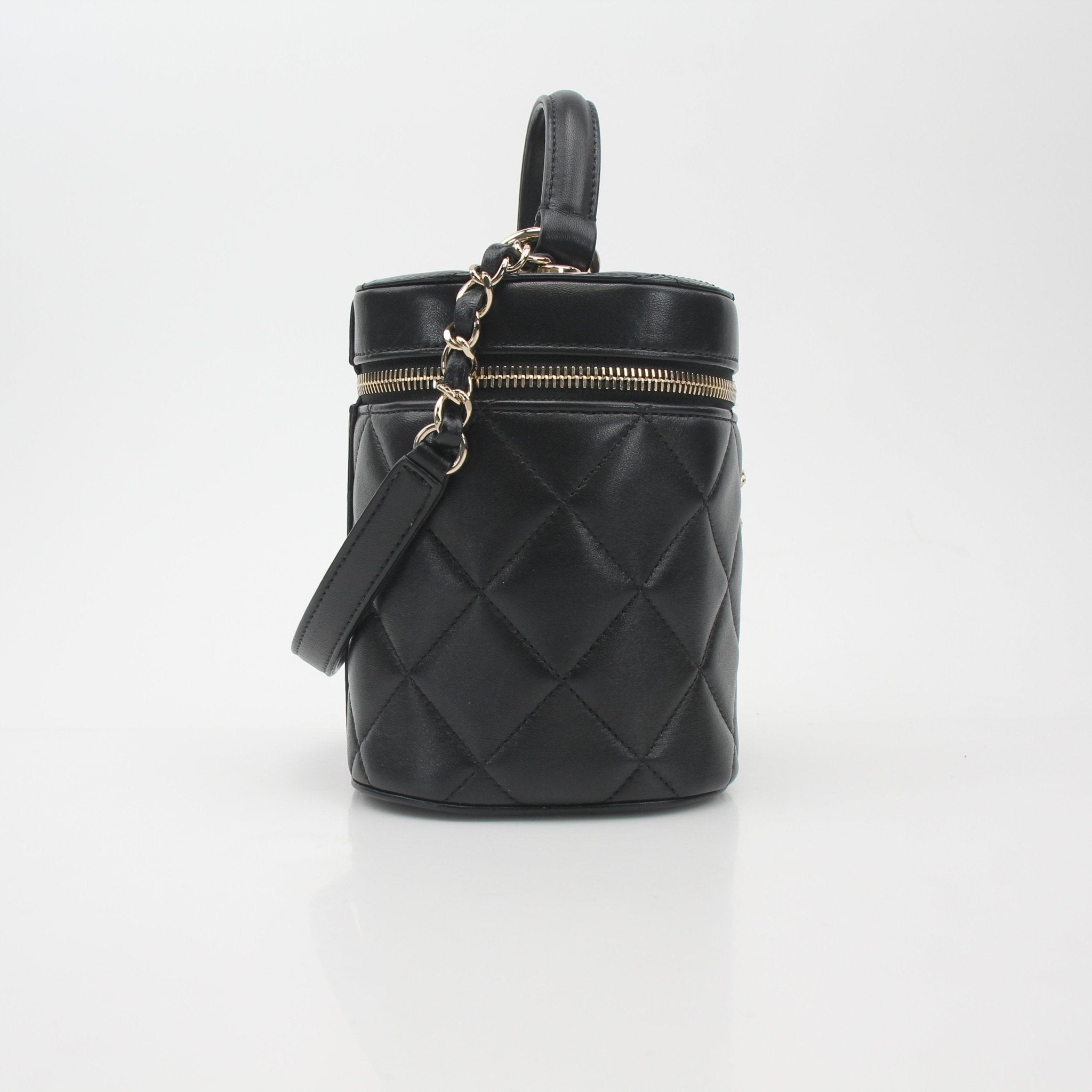 Gold & Beyond Chanel quilted lambskin vanity case handbag with gold-tone hardware and compact design.