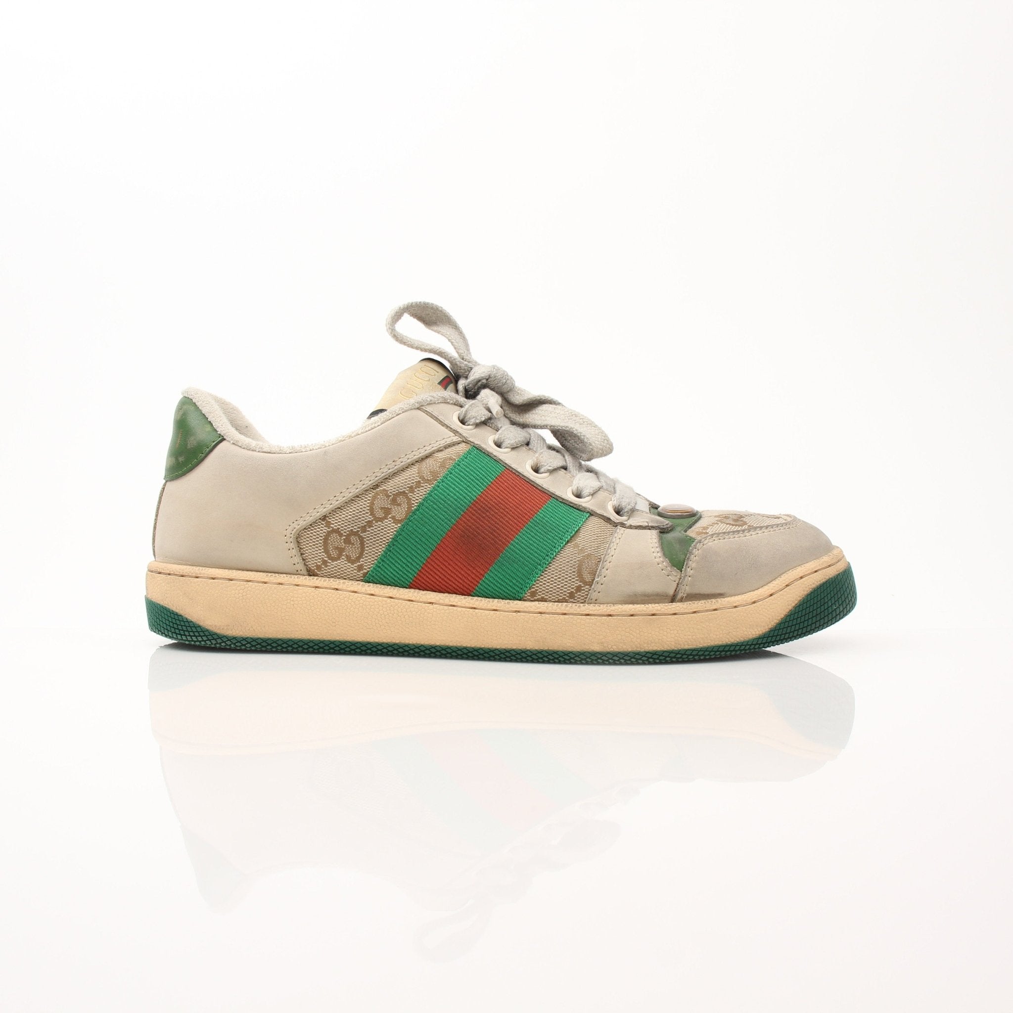 Gold & Beyond Gucci men's distressed effect screener sneakers, casual shoes with a worn-in style and modern design.