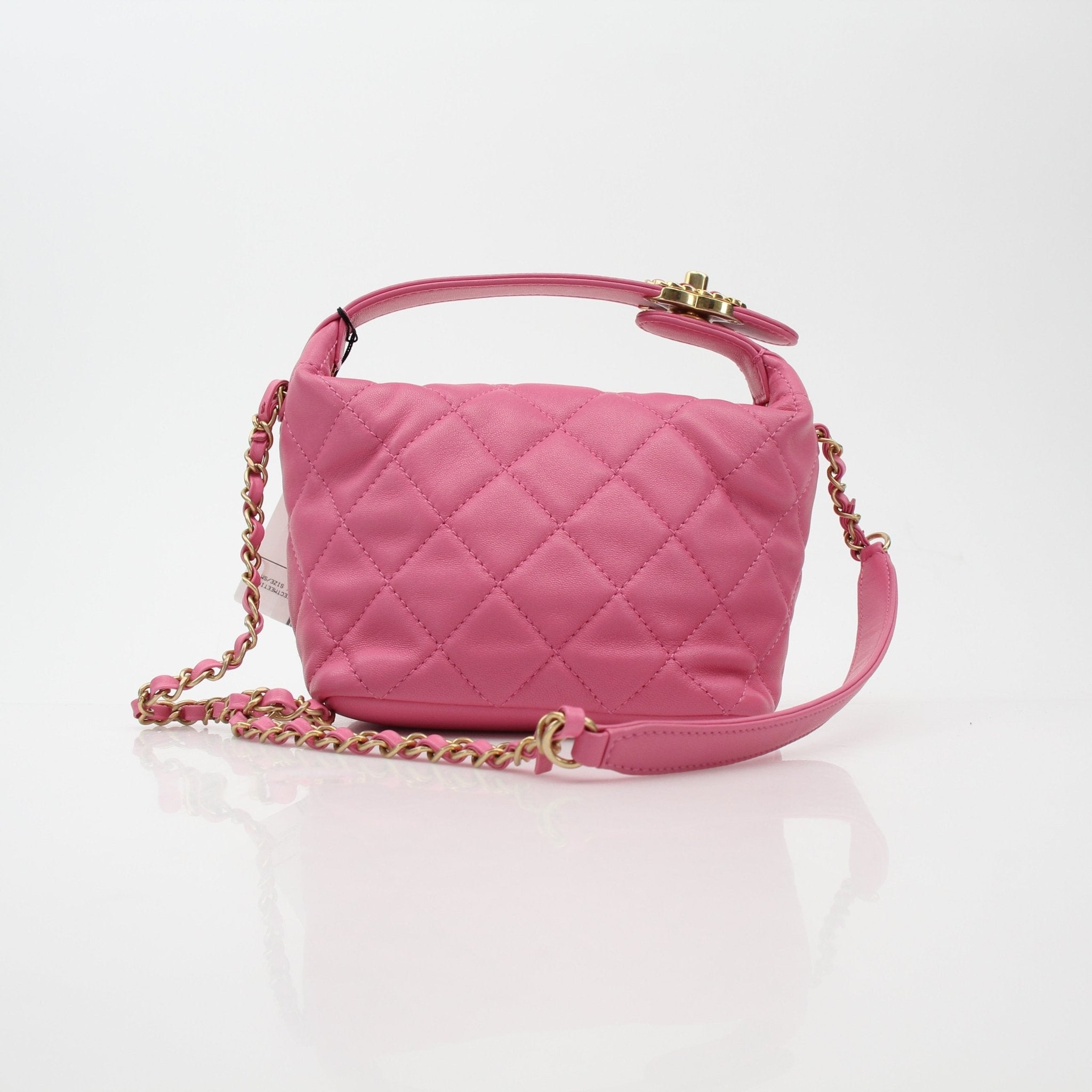 Chanel Pink Perfect Meeting Hobo Handbag by Gold & Beyond, showcasing a stylish pink leather handbag with gold accents and a shoulder strap.