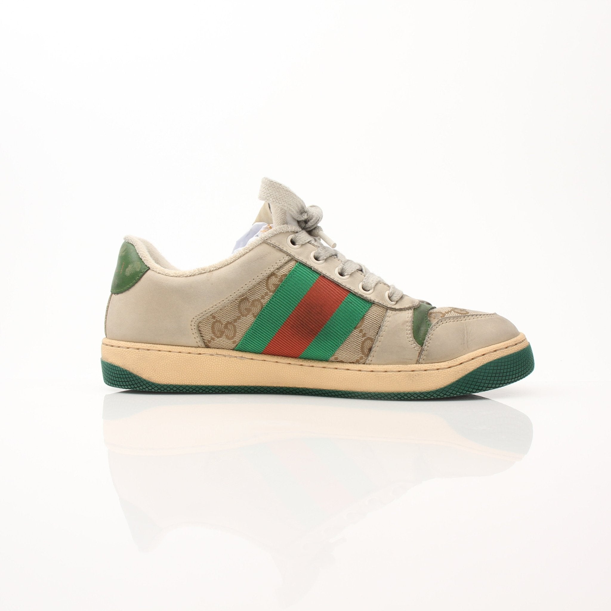 Gold & Beyond Gucci men's distressed effect Screener sneakers, stylish casual shoes with a rugged, worn-in look.