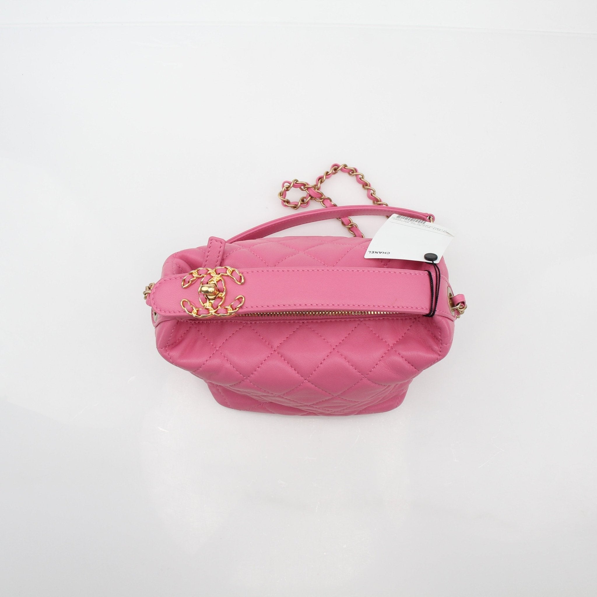 Gold & Beyond Chanel pink Perfect Meeting hobo handbag with soft leather and stylish design, featuring top handles and subtle branding.