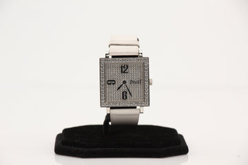 Gold & Beyond Piaget Dancer lady's watch featuring an 18K diamond bezel and elegant design on a white background.