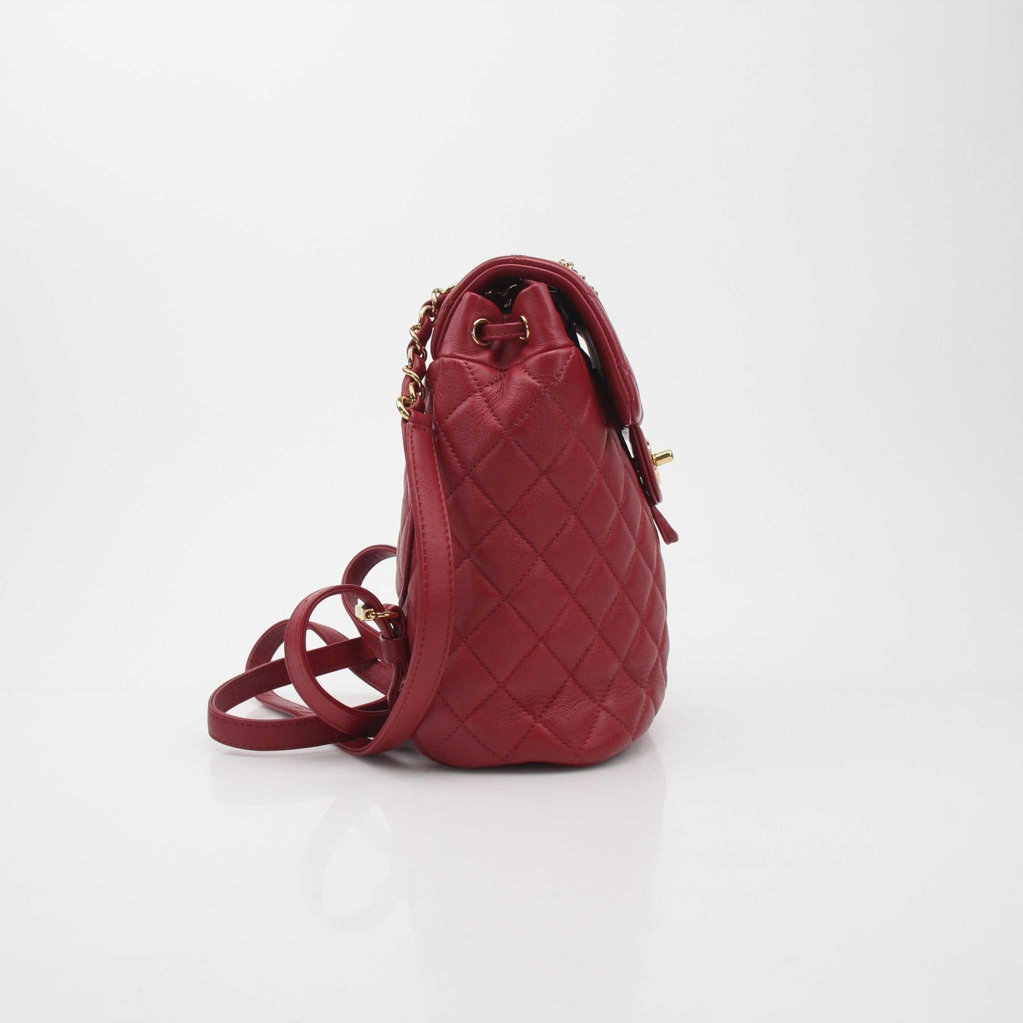 Chanel Urban Spirit quilted lambskin backpack handbag with gold-tone hardware and adjustable straps, showing front view.