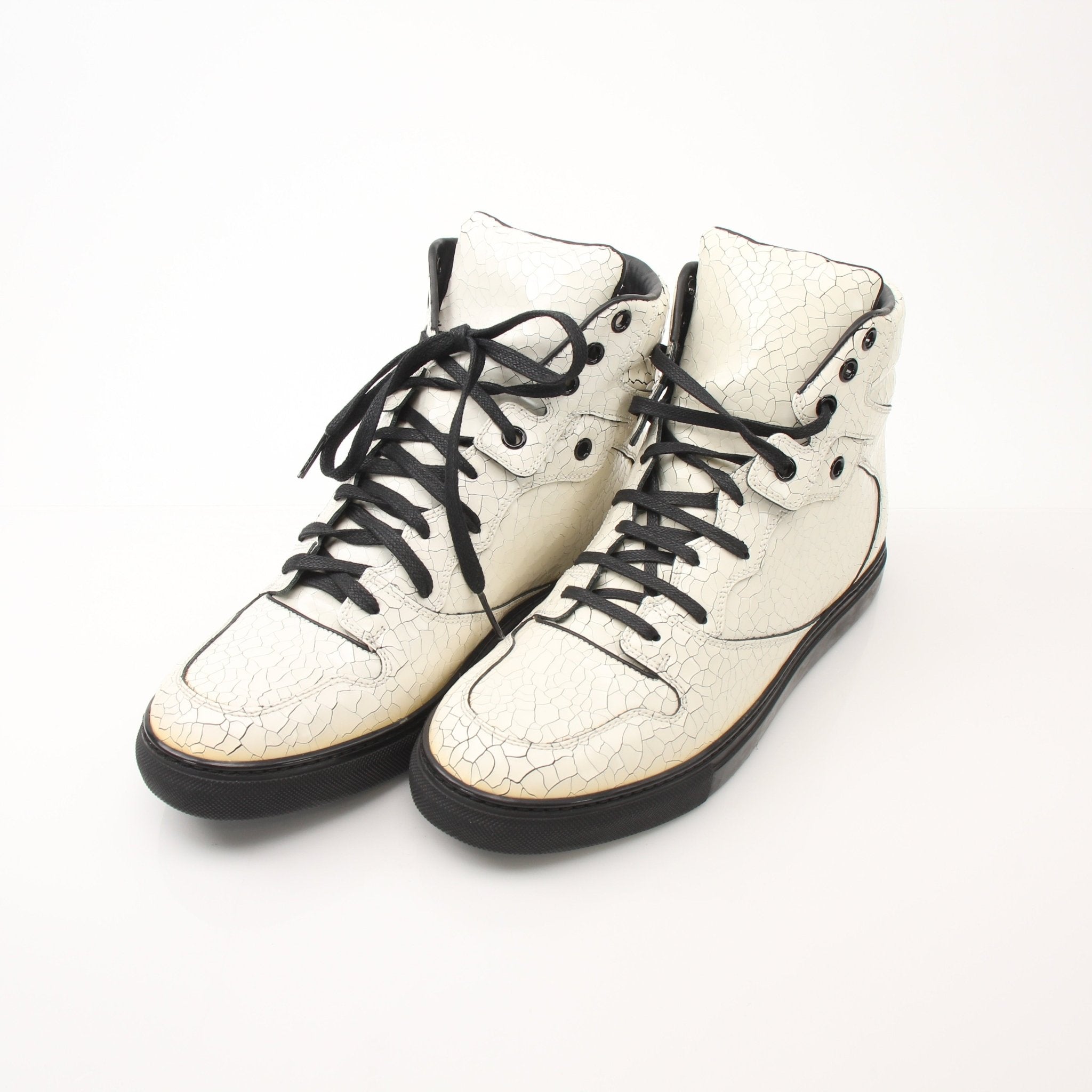 Gold & Beyond Balenciaga Men’s Craquele high top sneakers with textured design, white laces, and stylish silhouette.
