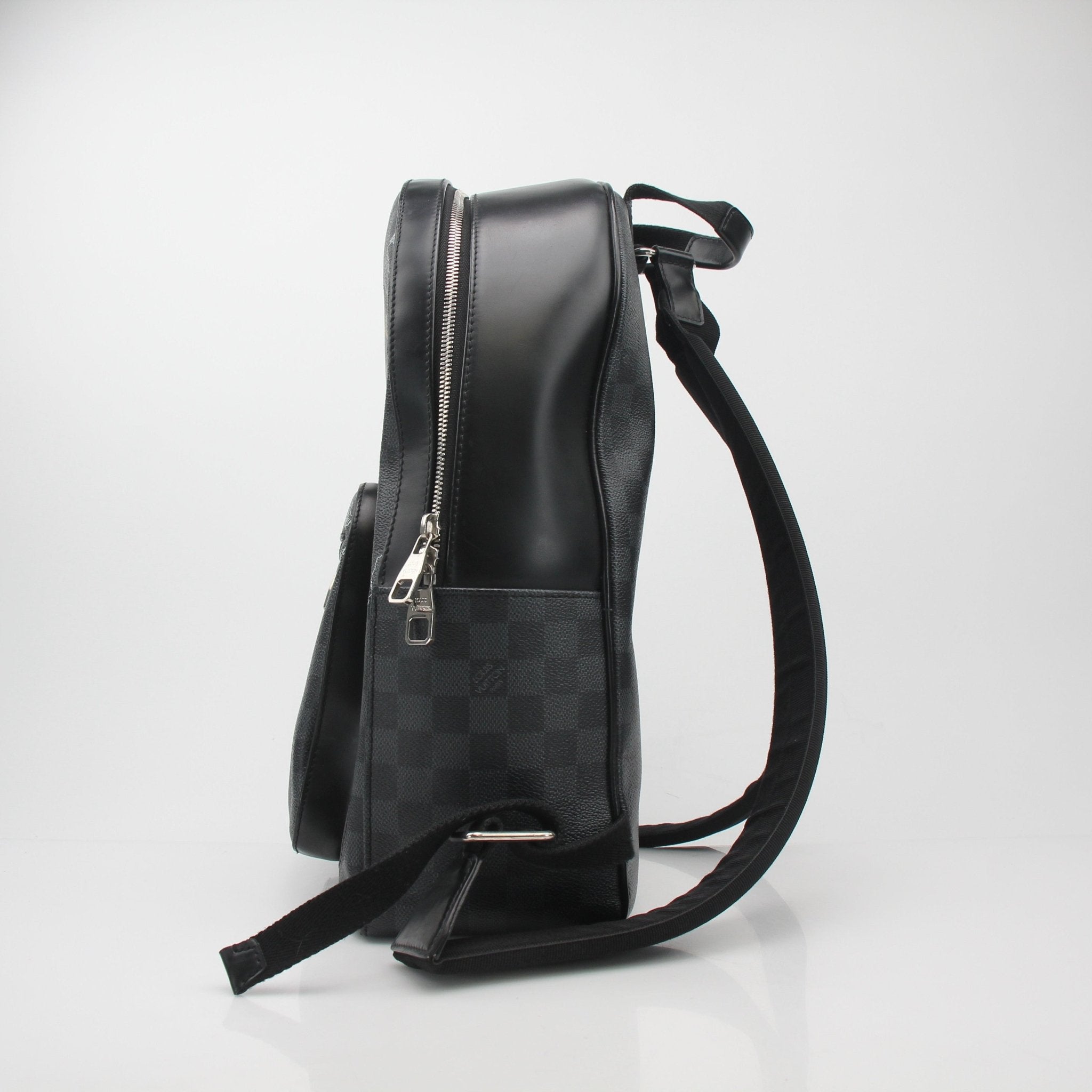 Louis Vuitton Around the World Damier Graphite backpack, a stylish travel bag with checkered pattern and leather accents.