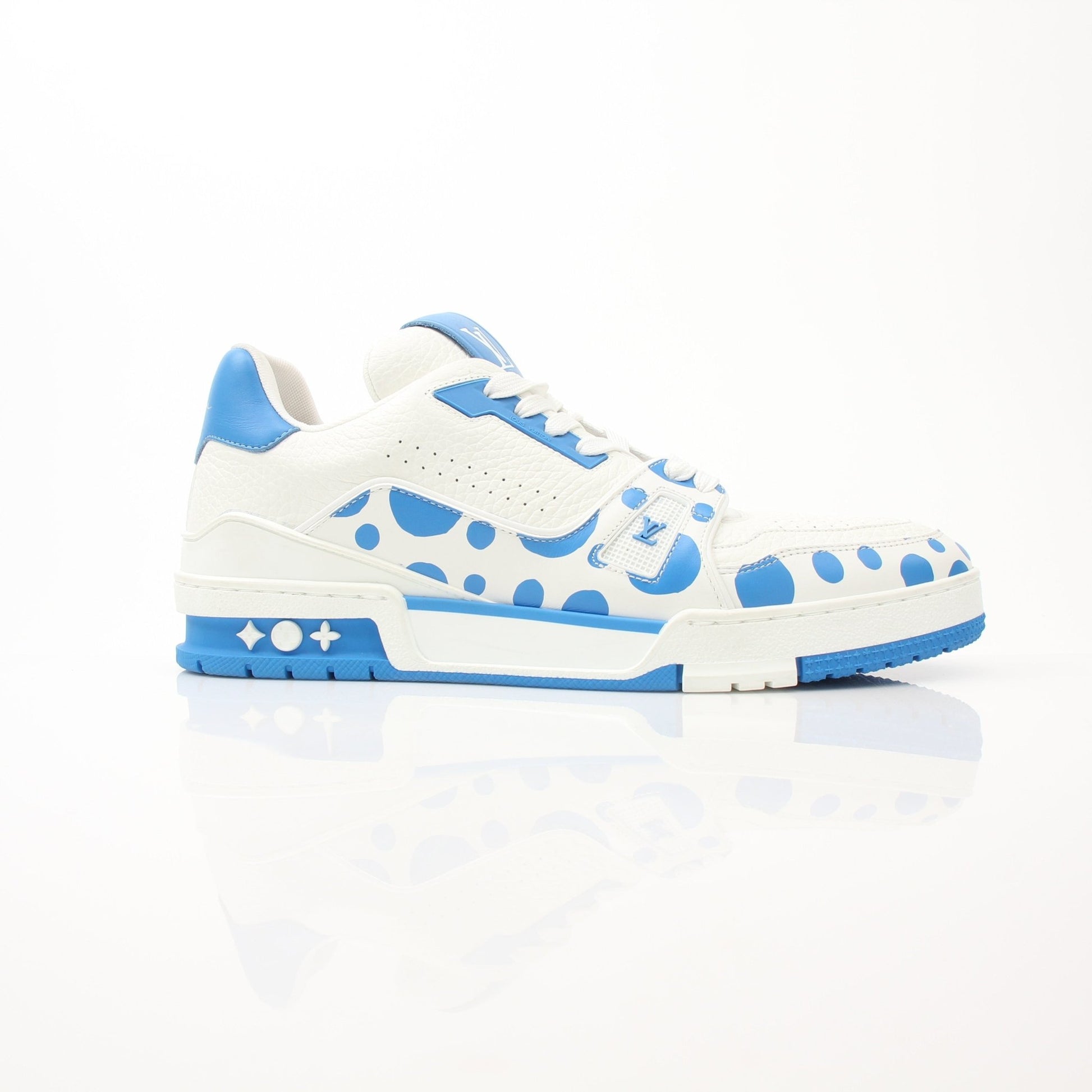 Louis Vuitton x Yayoi Kusama LV Trainer sneakers in vibrant design with Louis Vuitton branding and colorful patterns.