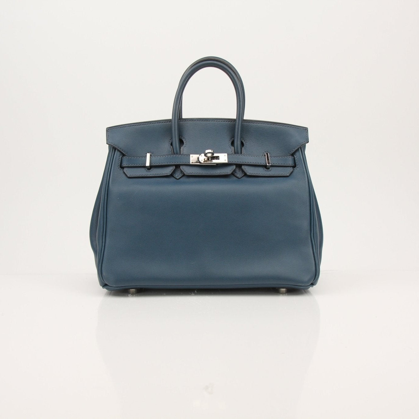 Hermès Birkin 25 blue handbag by Gold & Beyond, stylish leather accessory with gold hardware and top handles.