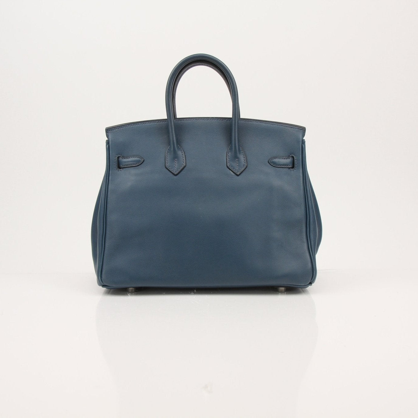 Hermès Birkin 25 blue handbag by Gold & Beyond, showcasing luxurious leather and classic design.