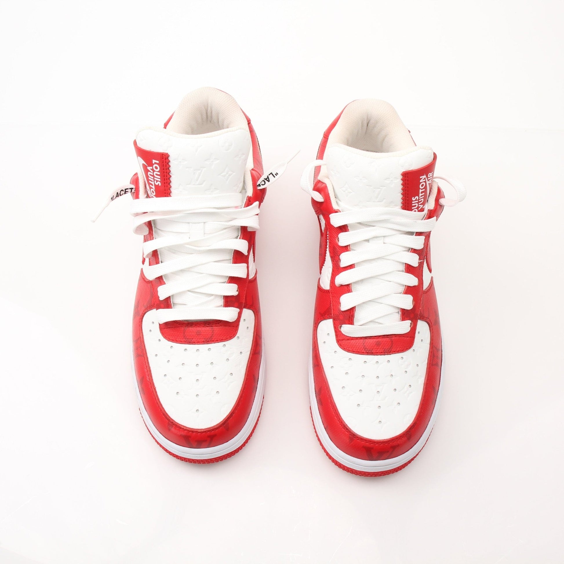 Gold & Beyond Louis Vuitton x Nike Air Force 1 Low sneakers, stylish shoes with luxury branding and classic sneaker design.