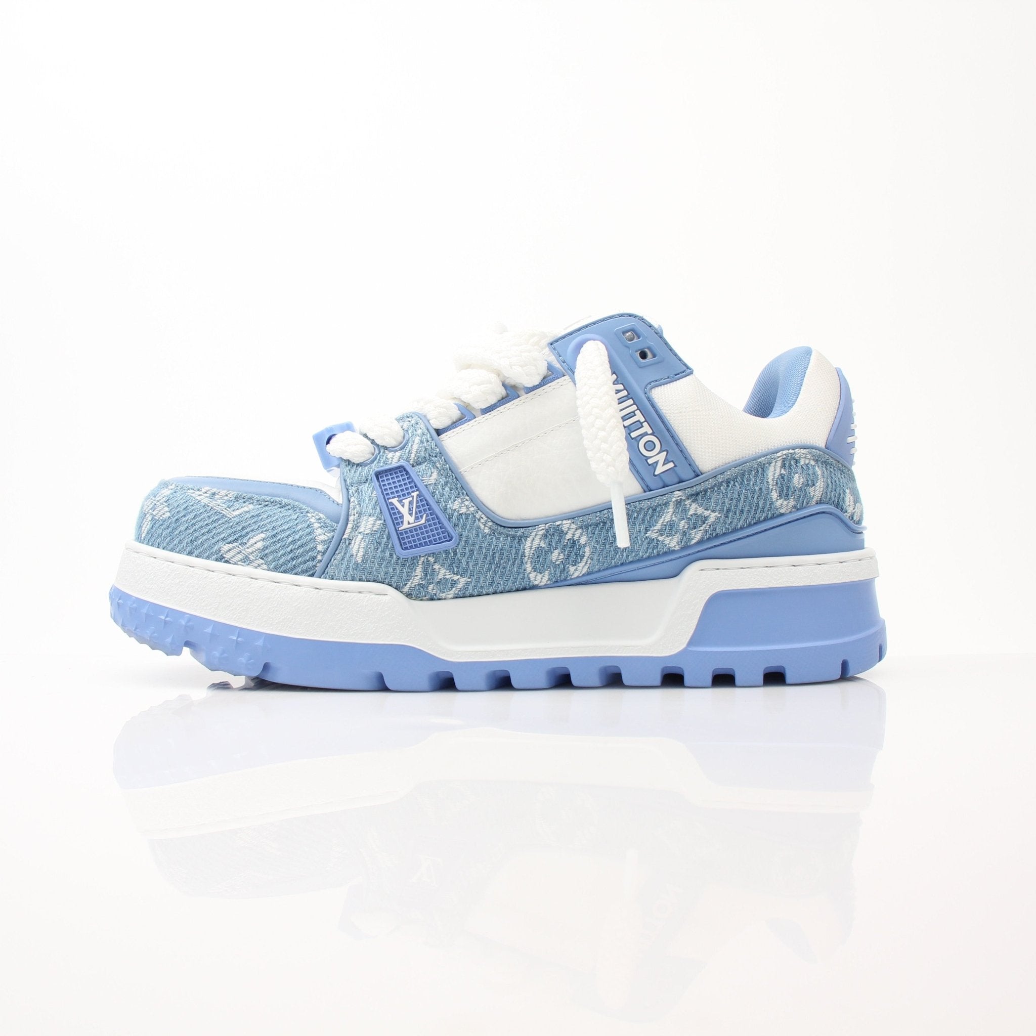 Louis Vuitton Maxi Sneakers by Gold & Beyond, stylish shoes with white and gold accents, detailed laces, and branded design.