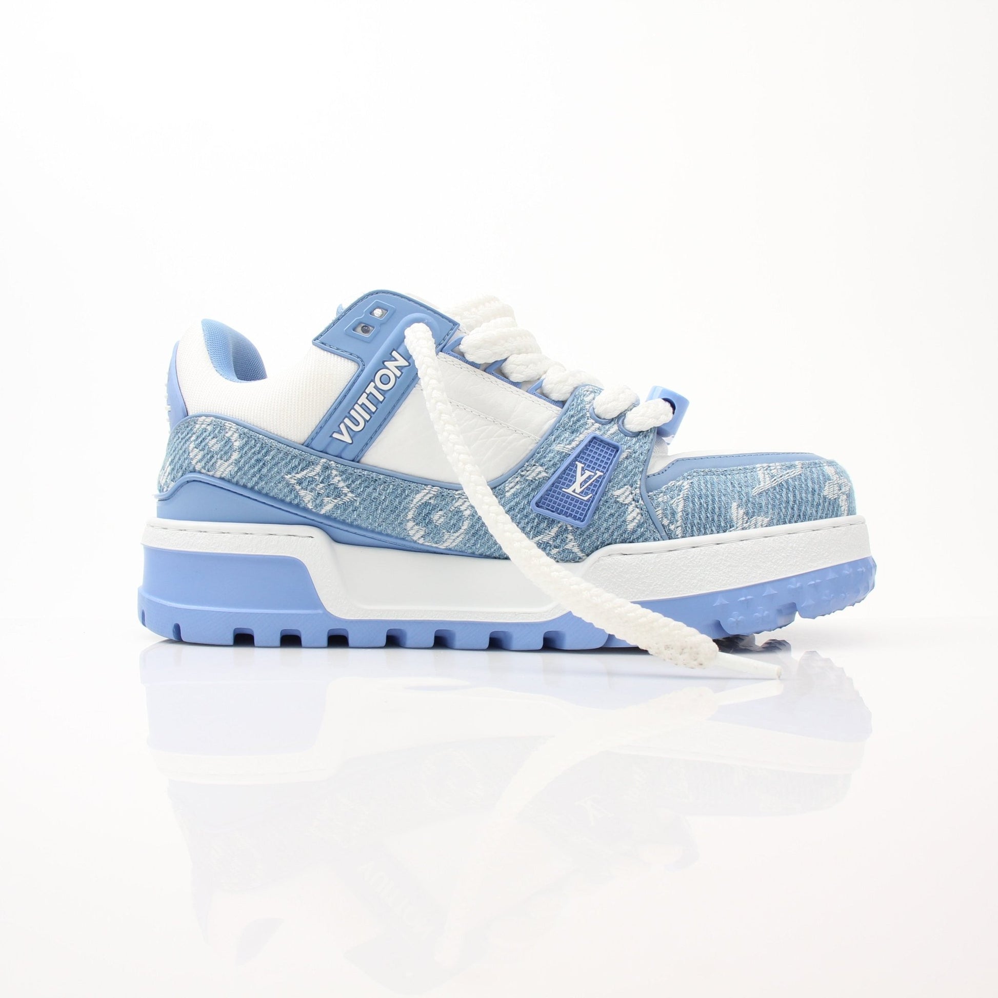 Louis Vuitton Maxi Sneakers from Gold & Beyond, stylish shoes featuring a sleek design and premium materials.
