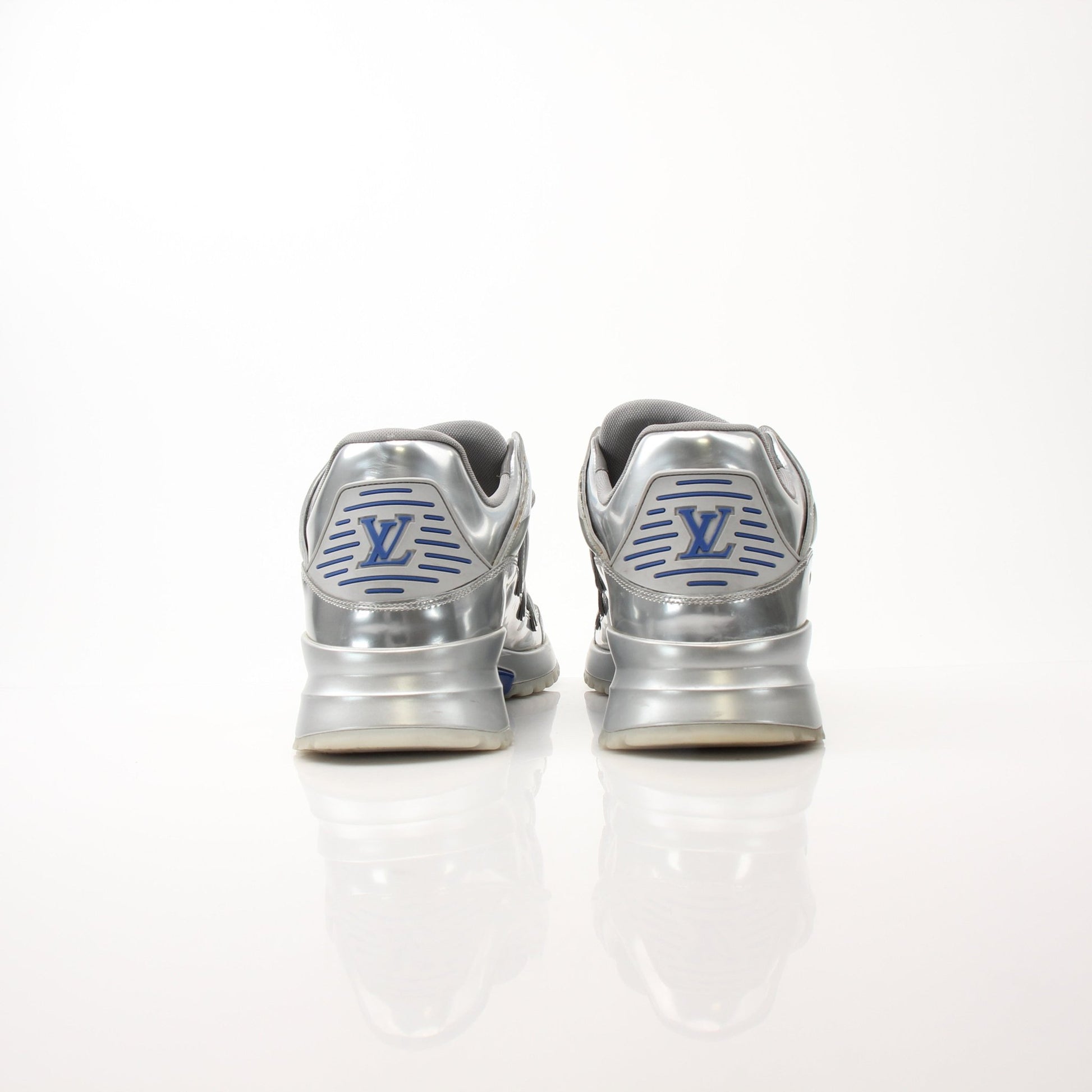 Gold & Beyond Louis Vuitton Zig Zag Sneakers, stylish shoes with bold zigzag pattern and sleek design, close-up front view.