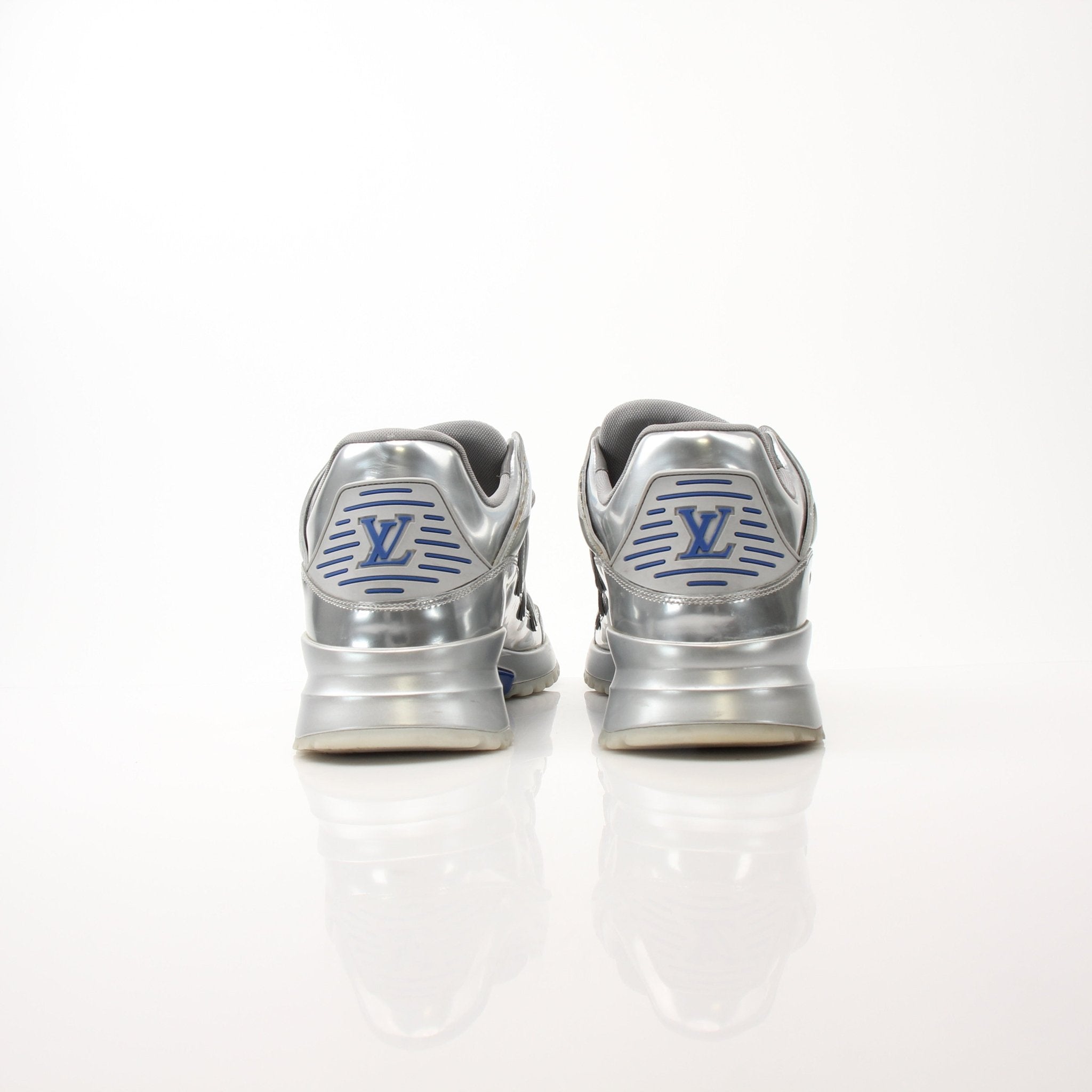 Gold & Beyond Louis Vuitton Zig Zag Sneakers, stylish shoes with bold zigzag pattern and sleek design, close-up front view.