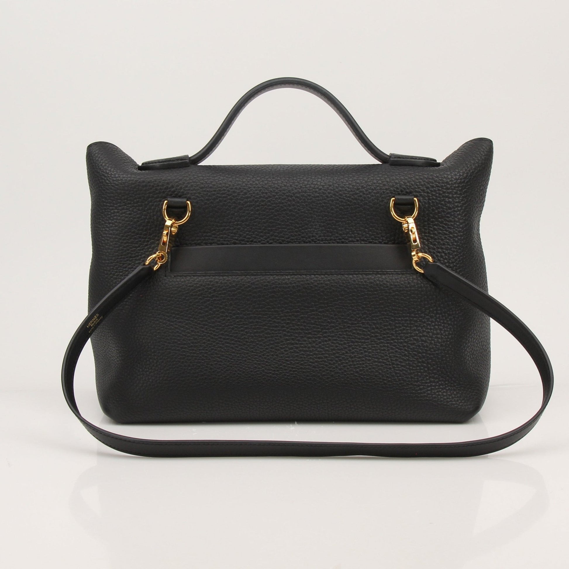 Hermès Top Handle Clemence handbag by Gold & Beyond, showcasing its elegant leather design and gold-tone hardware.