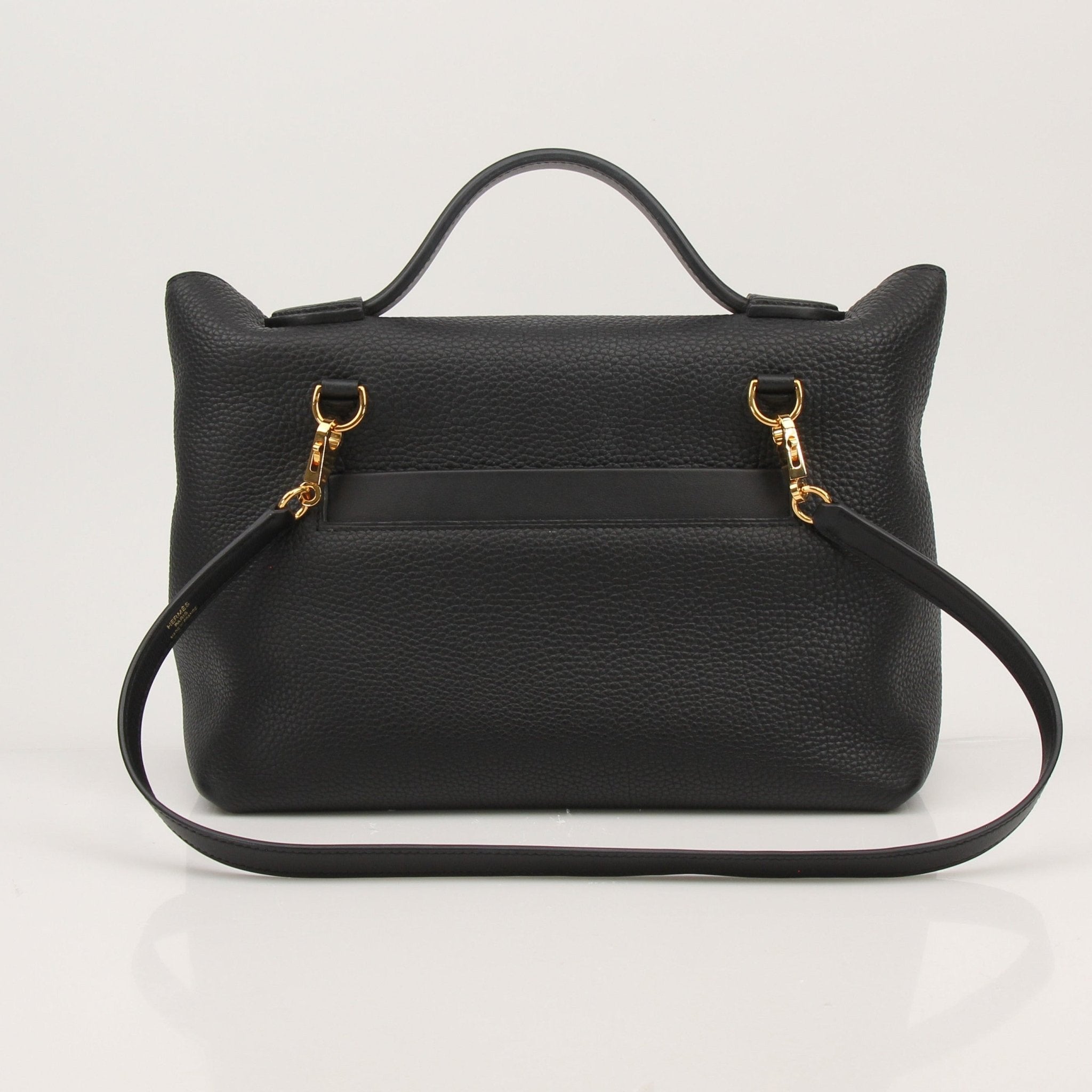 Hermès Top Handle Clemence handbag by Gold & Beyond, showcasing its elegant leather design and gold-tone hardware.