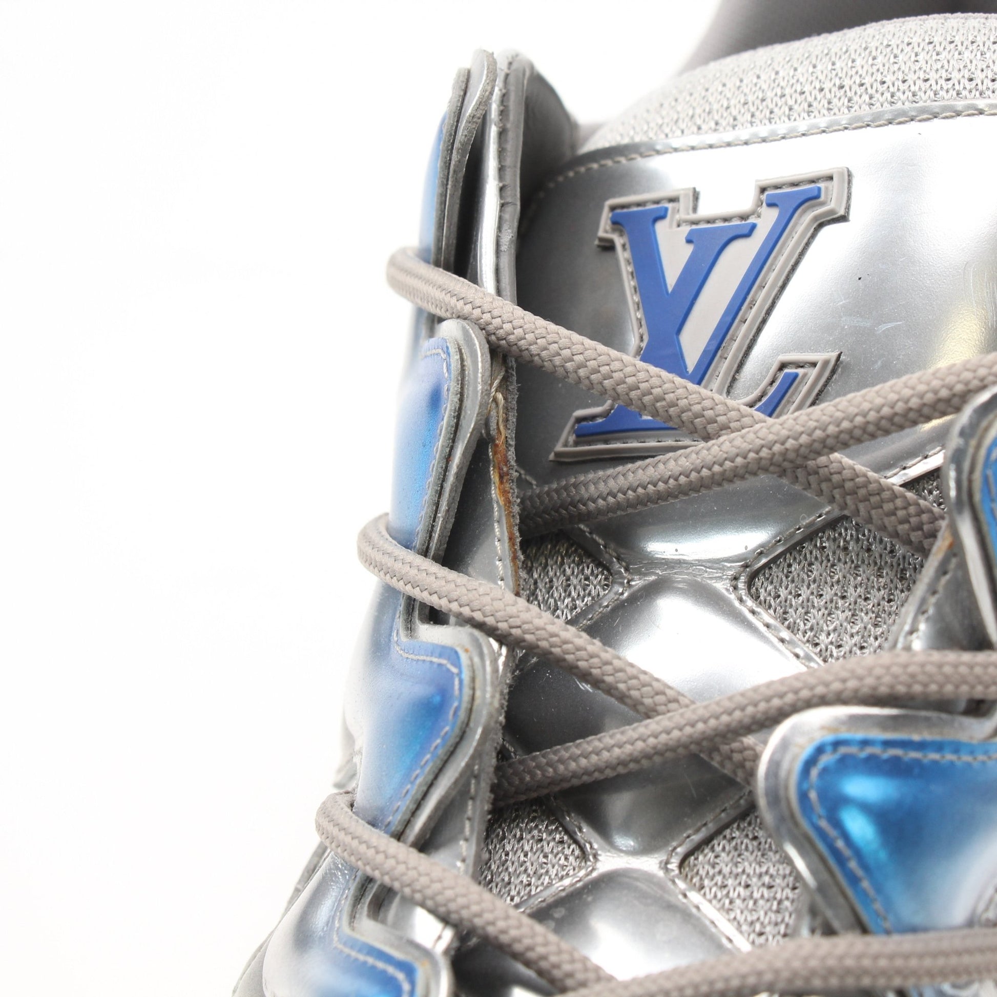 Louis Vuitton Zig Zag Sneakers by Gold & Beyond, showing stylish shoes with bold zigzag pattern in a close-up view