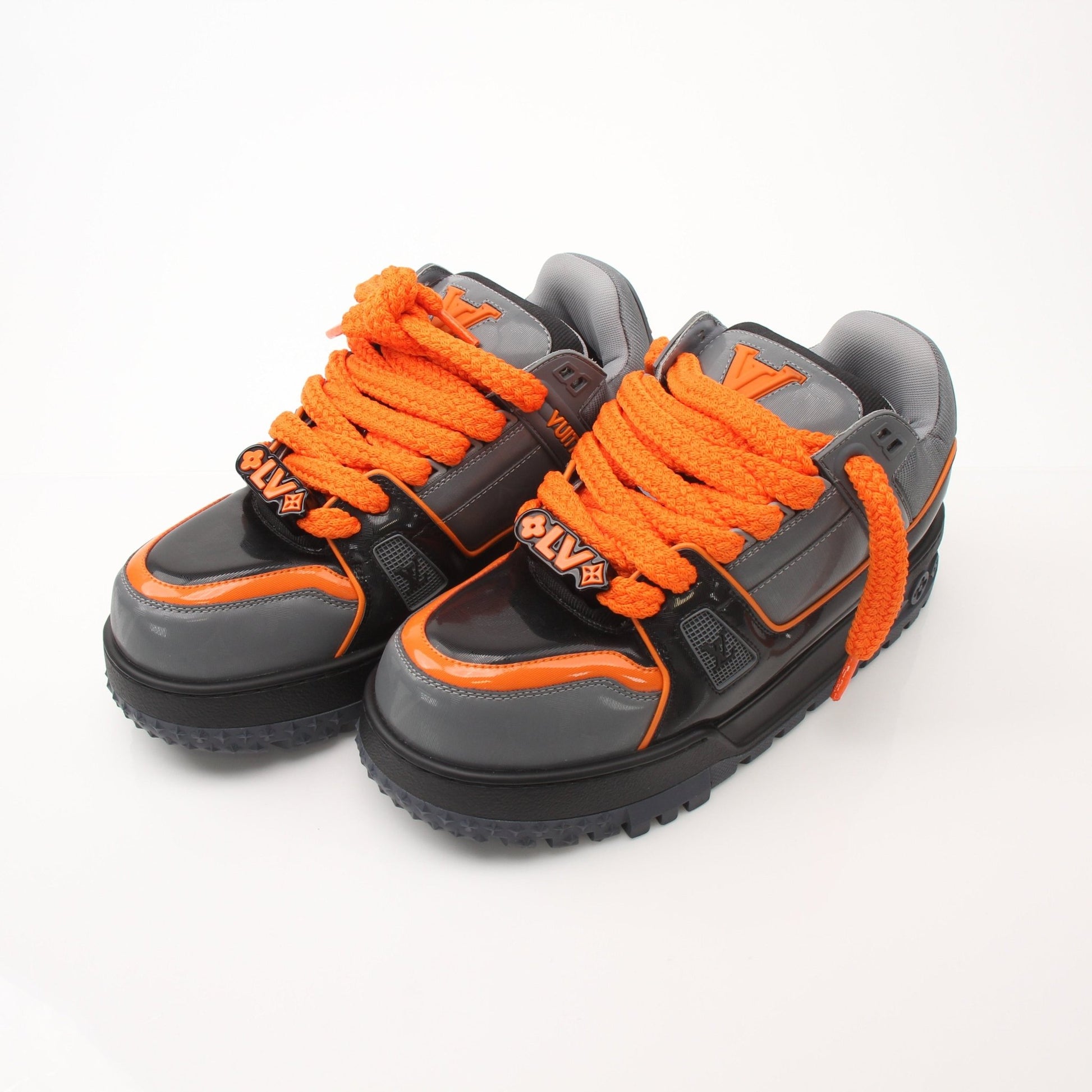 Gold & Beyond Louis Vuitton Maxi Sneakers, stylish shoes with premium design, visible laces, and modern silhouette.