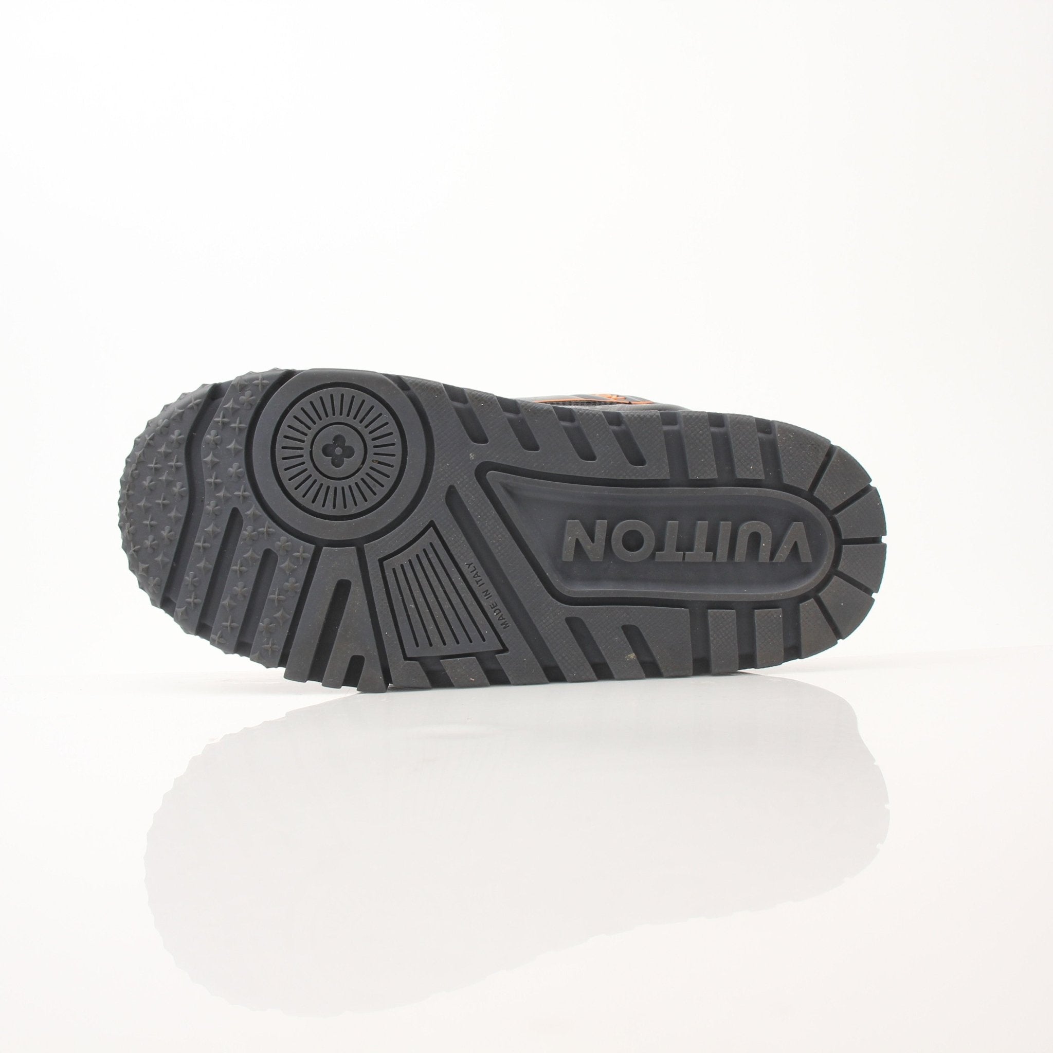 Gold & Beyond Louis Vuitton Maxi Sneaker, stylish shoes with a sleek design, visible laces, and premium materials.