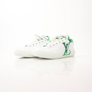 Gold & Beyond Louis Vuitton Charlie Sneakers, stylish shoes with a sleek design and signature branding, displayed on a plain background.