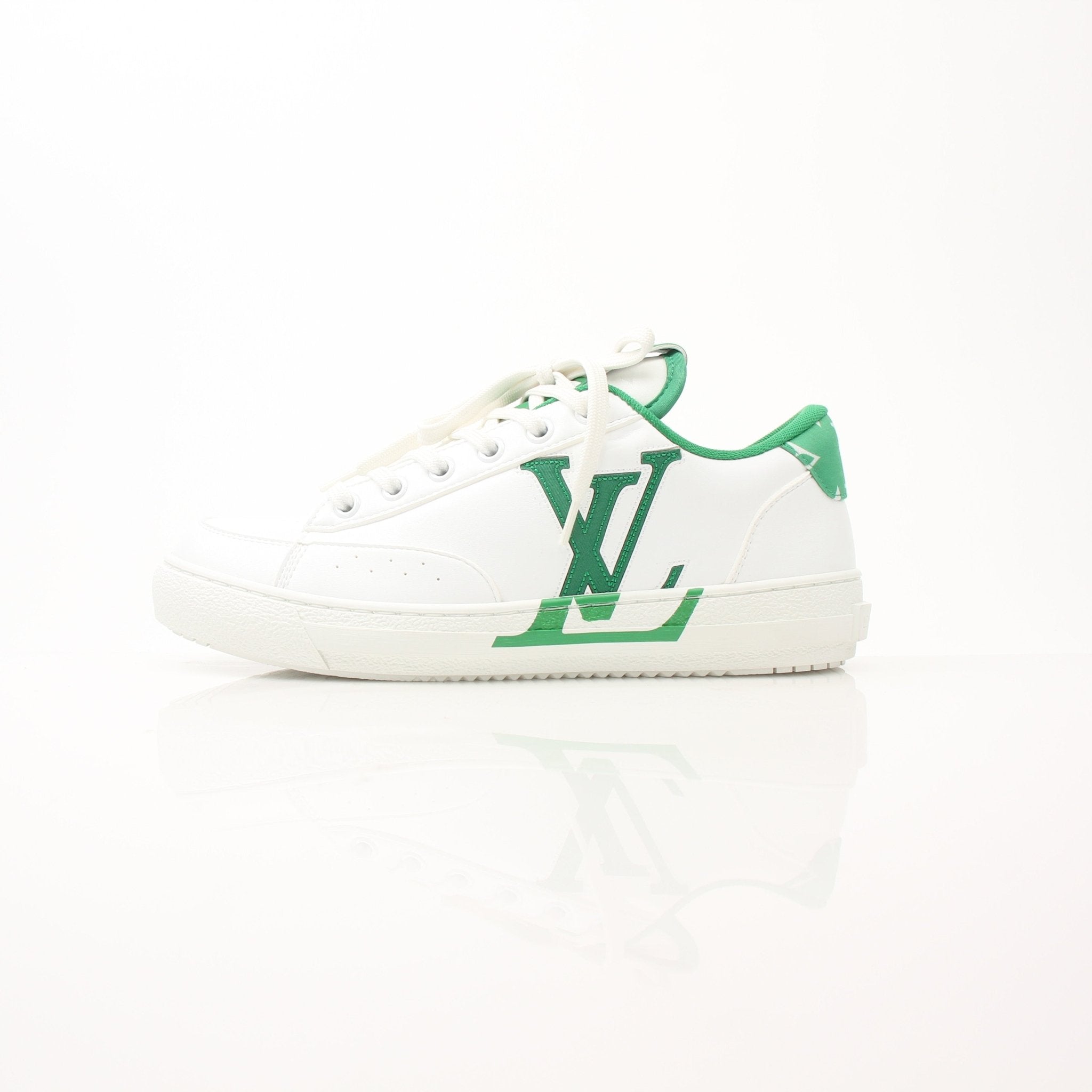 Gold & Beyond Louis Vuitton Charlie sneakers, stylish shoes with signature design, white and black color, detailed close-up image