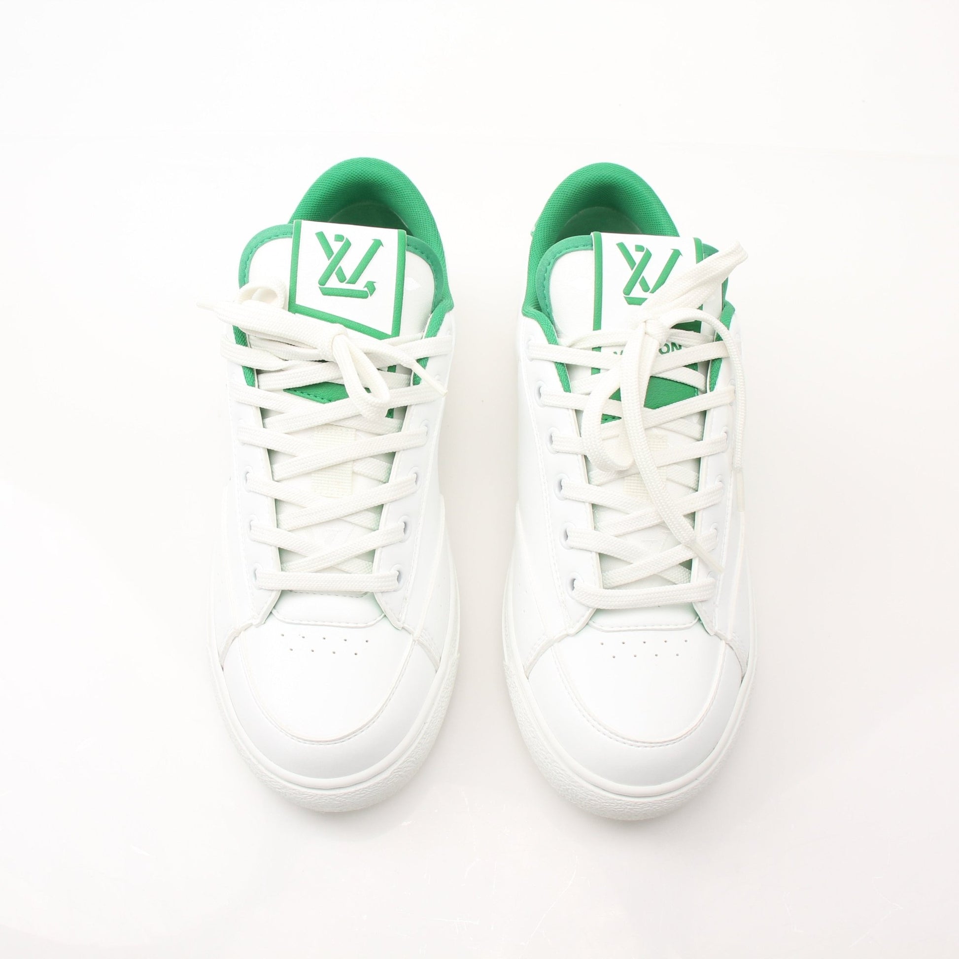 Louis Vuitton Charlie Sneakers by Gold & Beyond, stylish shoes with iconic LV design and modern athletic style, shown from a side view.