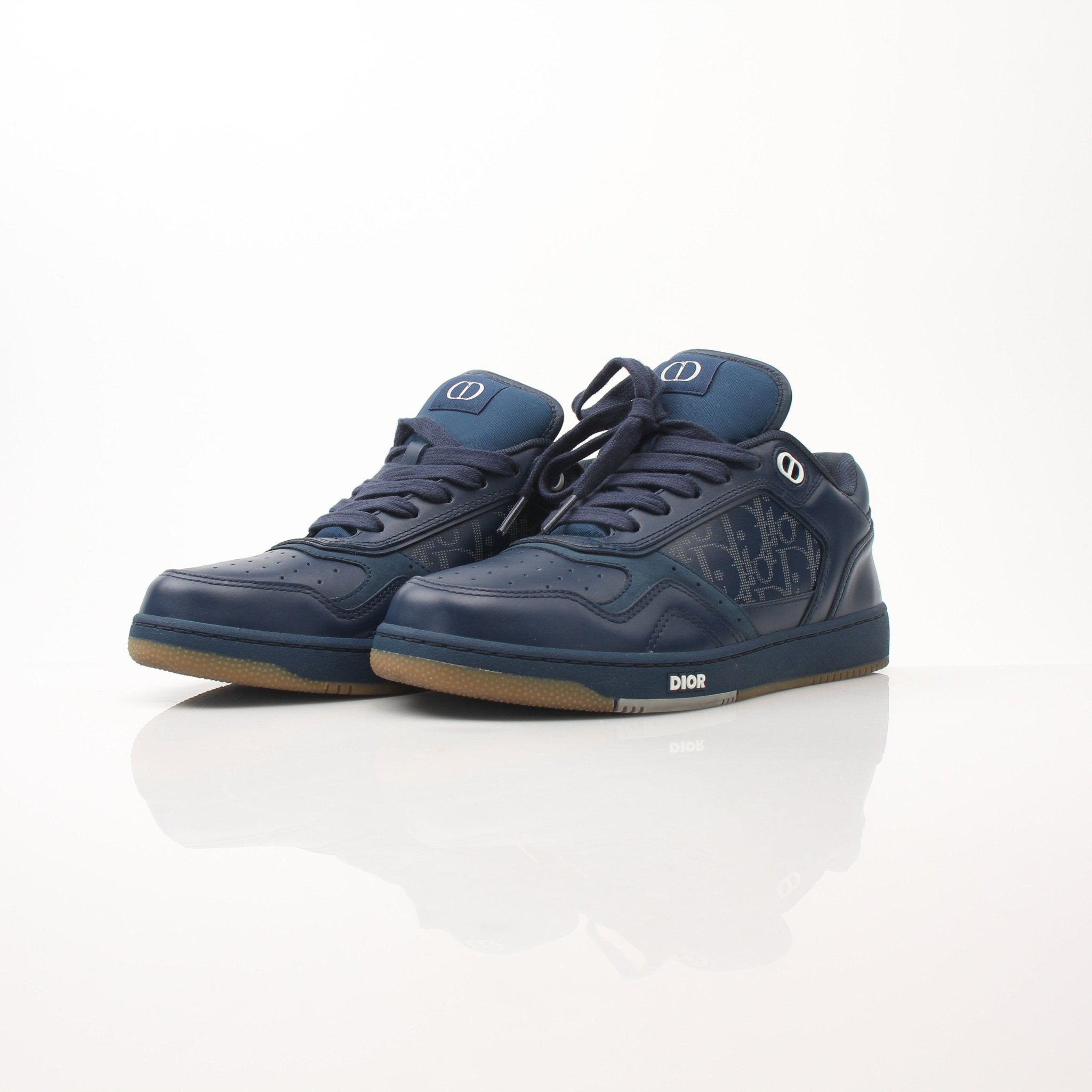 Christian Dior Navy Oblique sneakers by Gold & Beyond, showing the stylish navy shoes with Dior's signature oblique pattern on the fabric.
