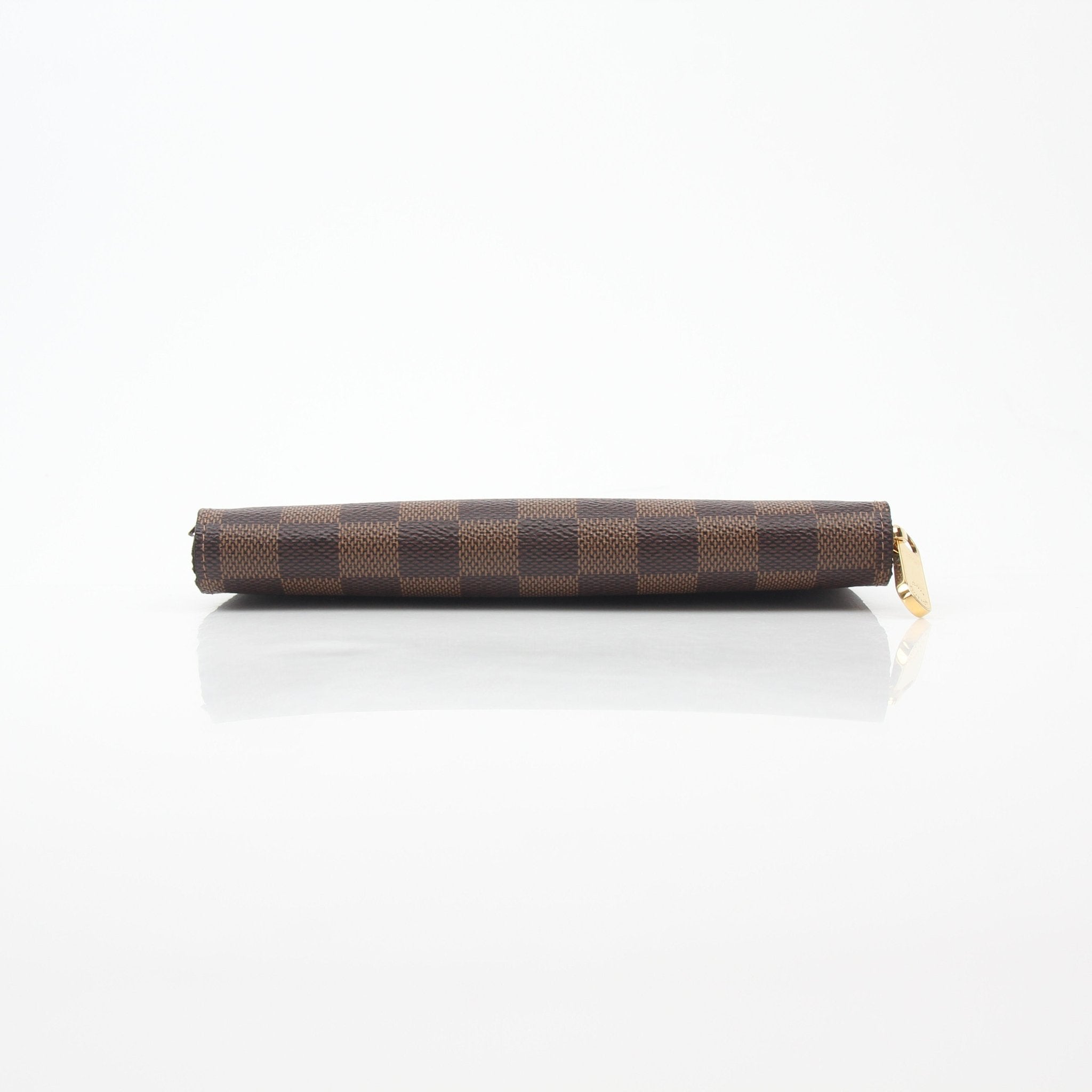 Louis Vuitton Damier Ebene Zippy Wallet with gold hardware, featuring multiple card slots and a zip-around design.