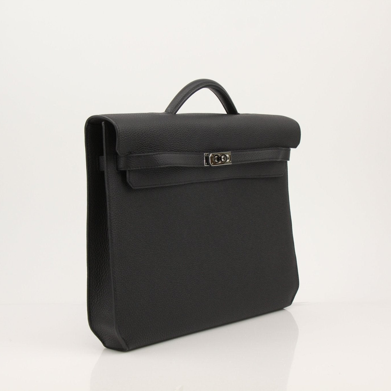 Gold & Beyond Hermès Sac à Dépêches briefcase handbag with sleek leather design and top handle, stylish and functional for professionals.
