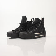 Christian Dior Black B23 high top sneakers by Gold & Beyond, showcasing stylish black shoes with Dior branding and high-top design.