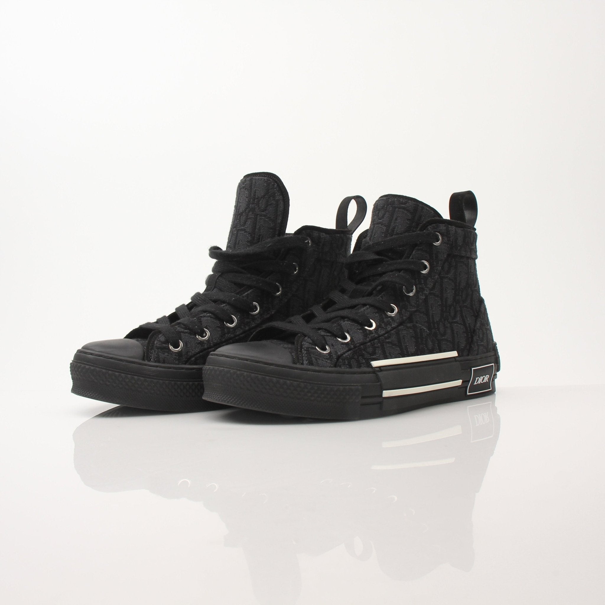 Christian Dior Black B23 high top sneakers by Gold & Beyond, showcasing stylish black shoes with Dior branding and high-top design.