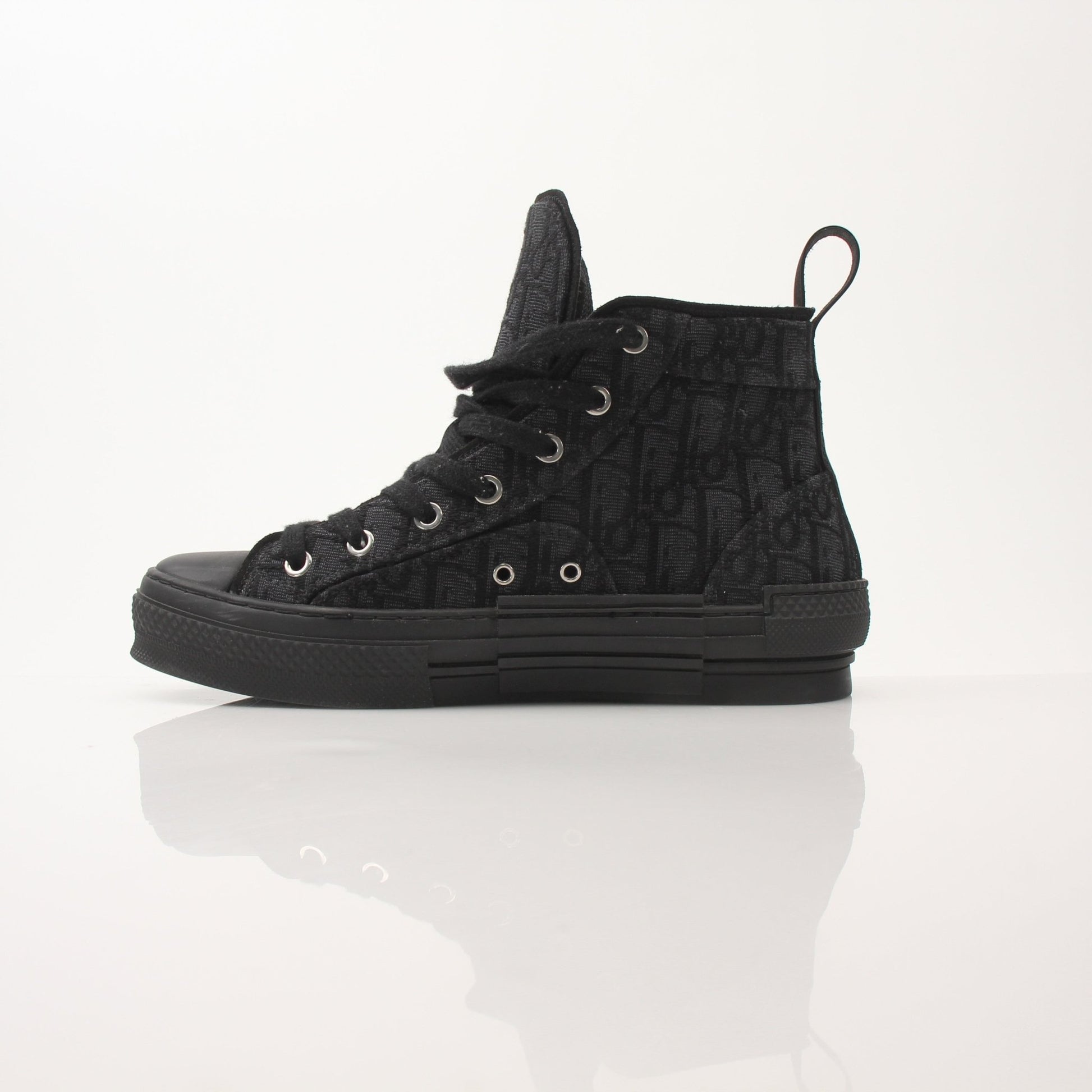 Christian Dior Black B23 high top sneakers with gold accents, stylish shoes featuring a modern design and premium material.