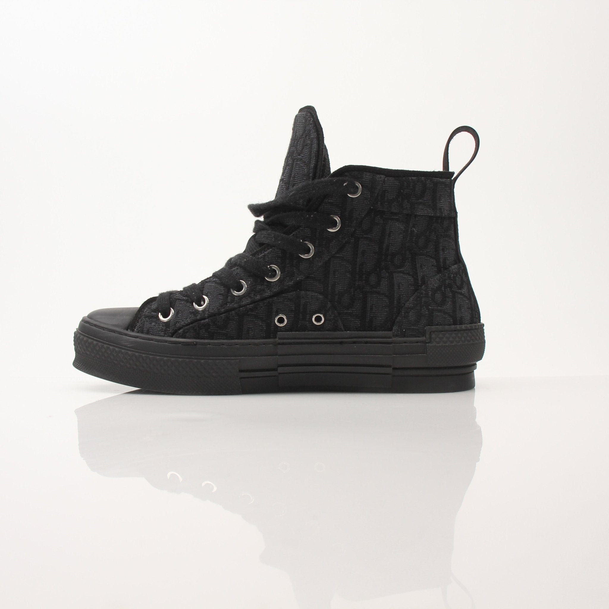 Christian Dior Black B23 high top sneakers with gold accents, stylish shoes featuring a modern design and premium material.