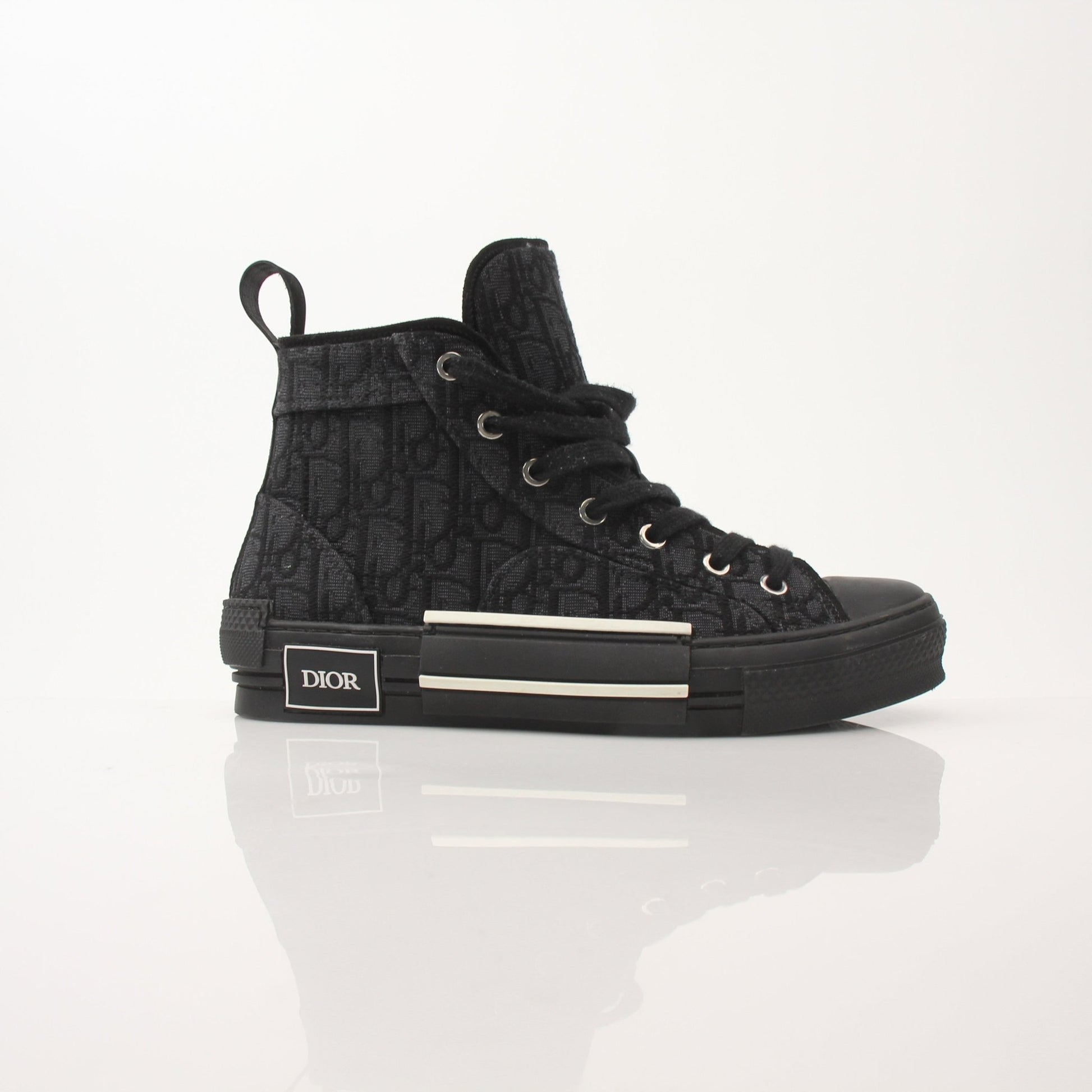 Christian Dior Black B23 high top sneakers with gold accents, featuring a sleek design and stylish sneaker details.