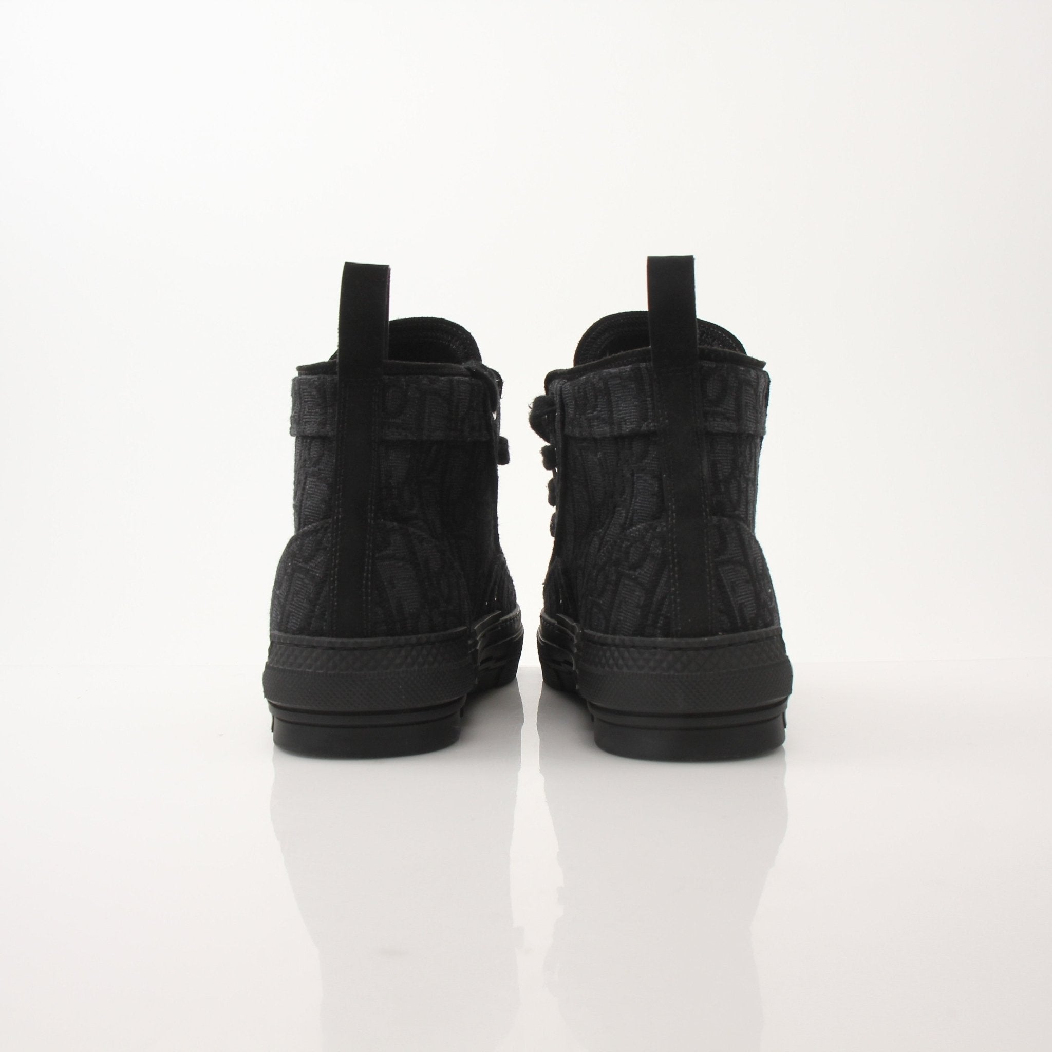Christian Dior Black B23 high top sneakers by Gold & Beyond, featuring black canvas and white rubber soles.